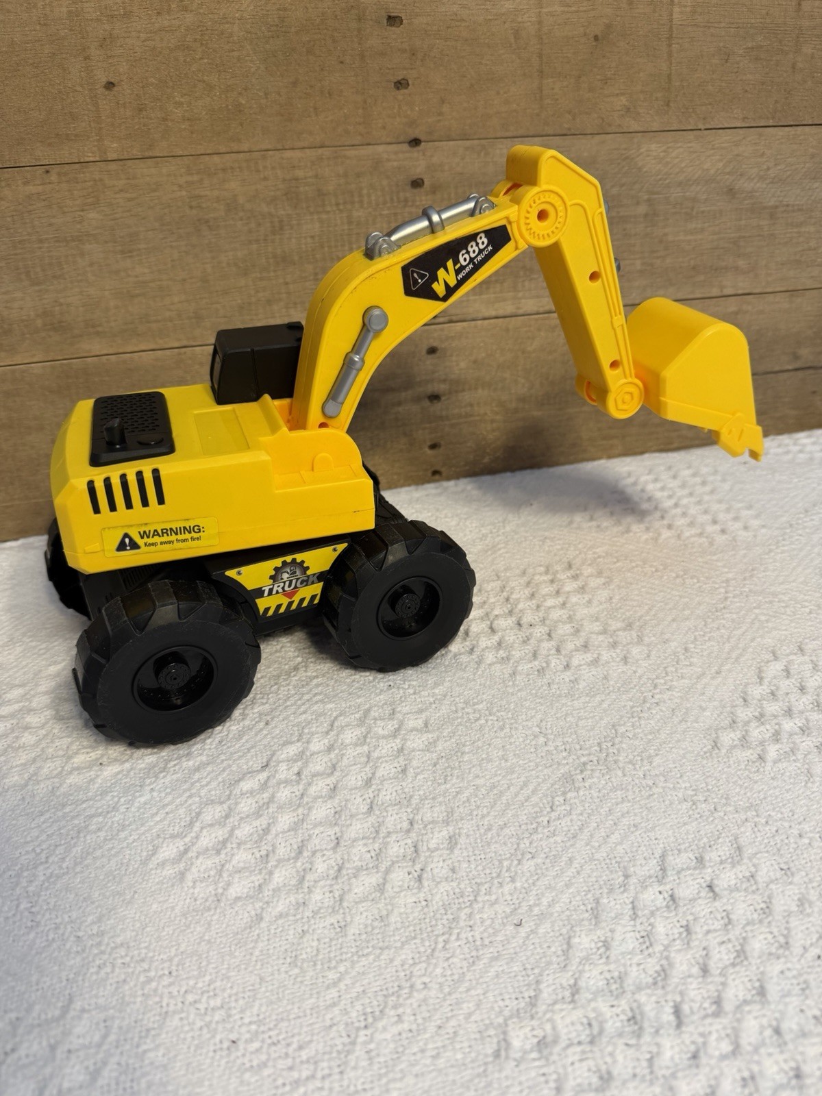 Yellow Electric Excavator Construction Vehicle Makes Noise Plastic Toy