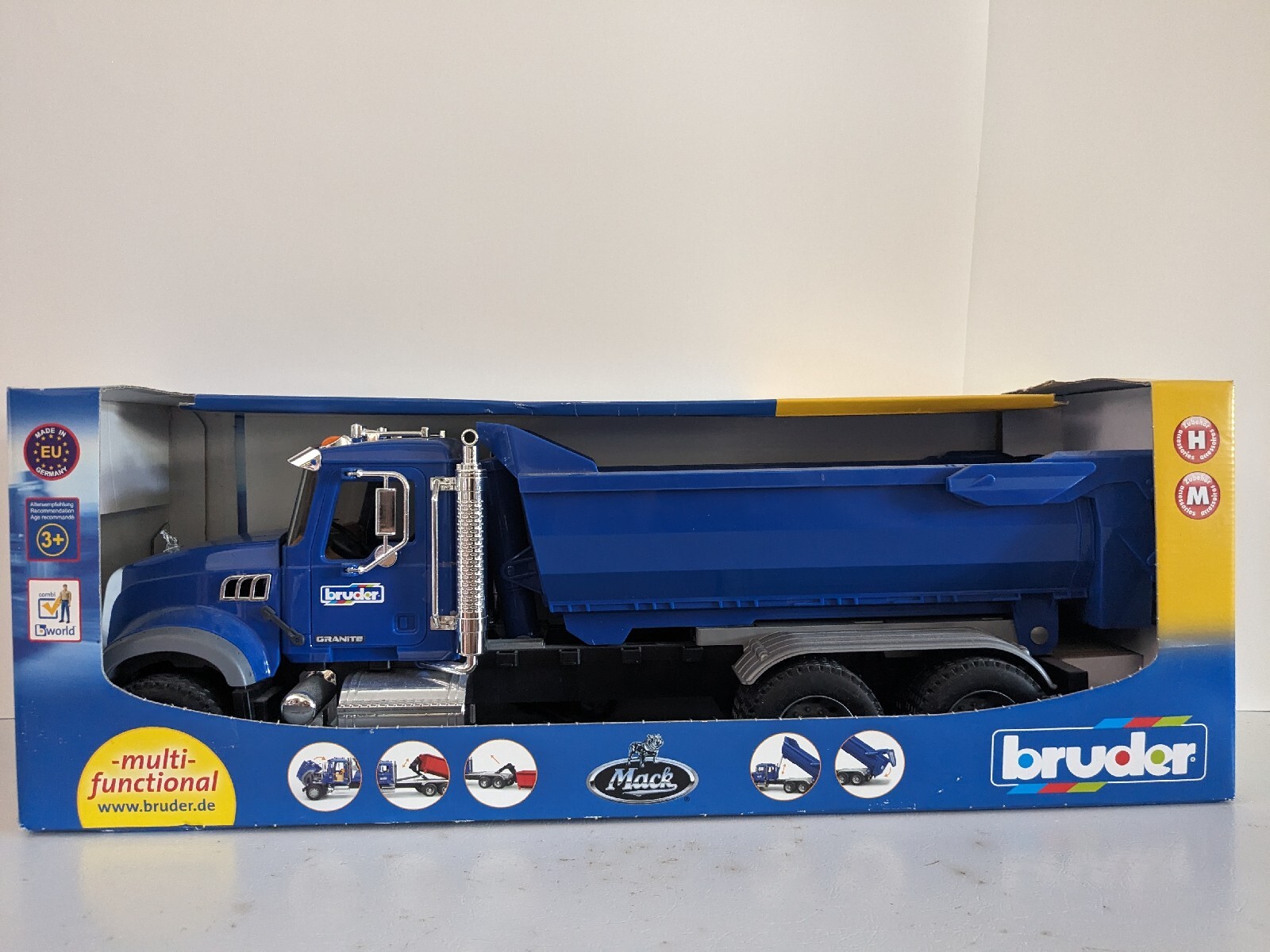 BRUDER MACK GRANITE HALF-PIPE DUMP TRUCK 02823