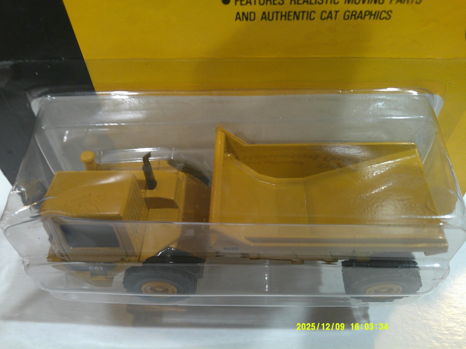 Ertl CAT D25D Articulated Dump Truck 1:64 Scale Darkish Yellow Fair Package