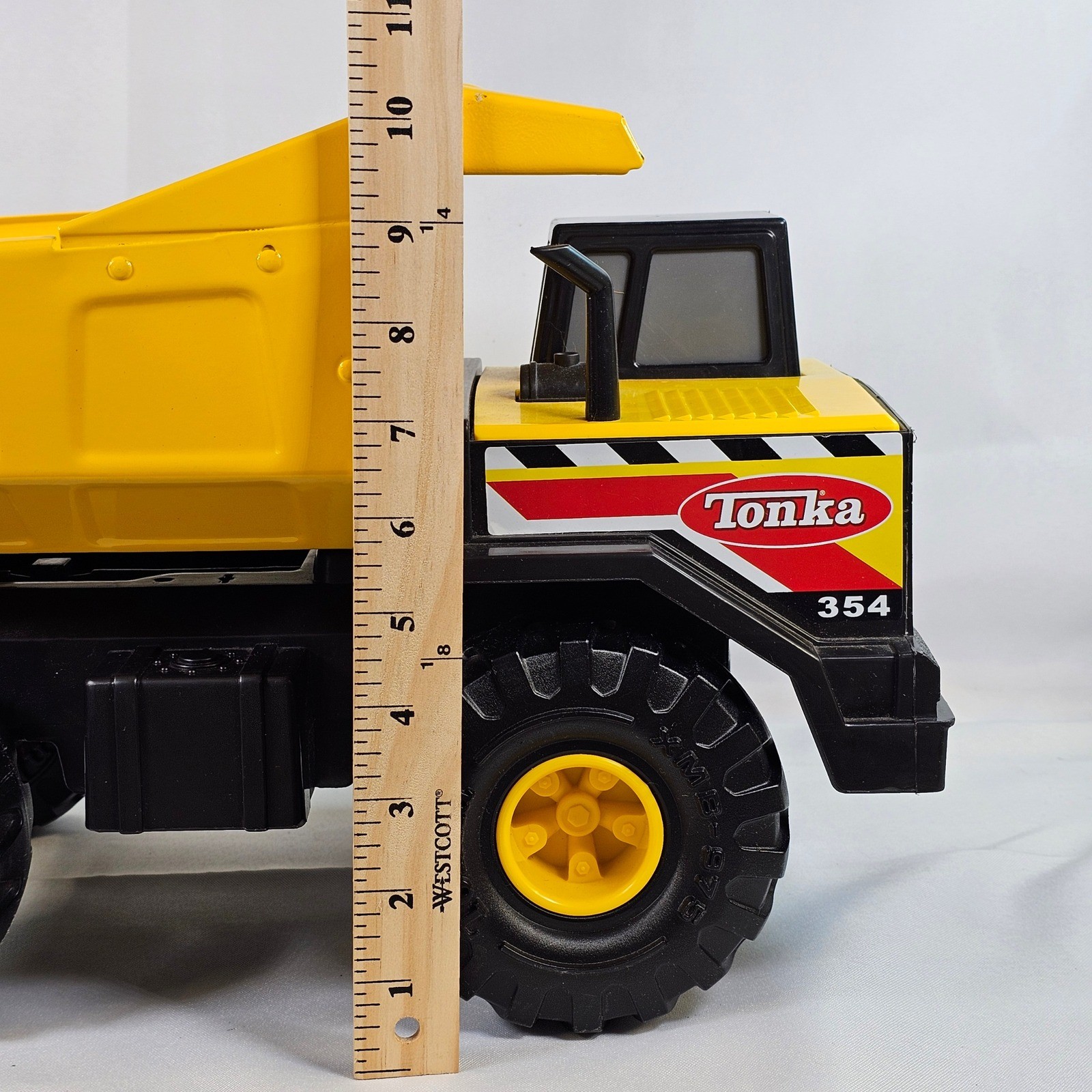 Tonka 354 Mighty Dump Truck Yellow Steel Bed Construction Toy Vehicle 17 Inch