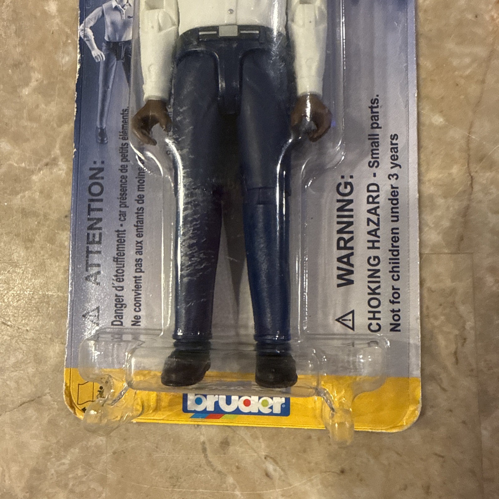 Bruder #60004 Man with Dark Skin and Dark Blue Jeans – NEW (Damaged Packaging)