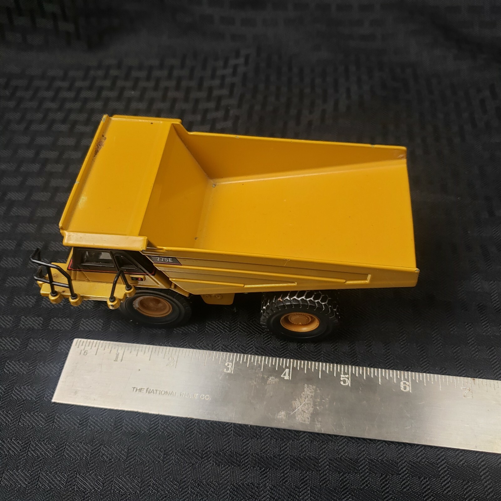 Norscot 1/64 Scale Diecast ~ Caterpillar 775E ~ Offroad Mining Dump Truck