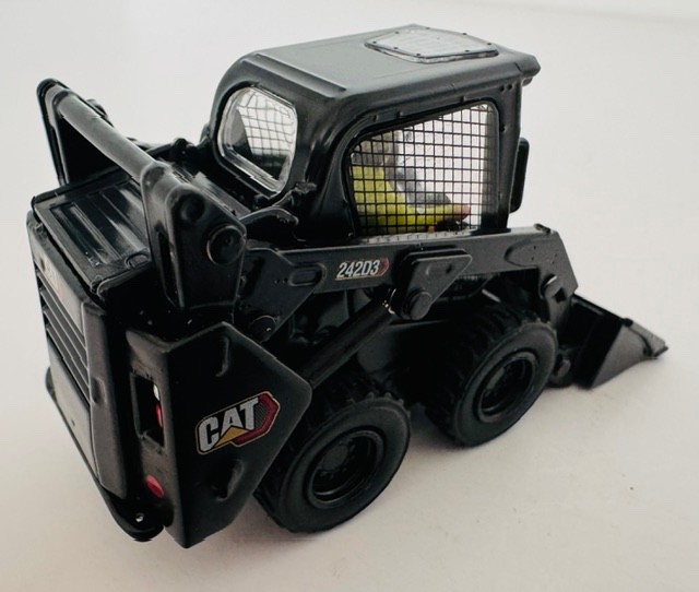 1:50 Caterpillar 242D3 Black Skid Steer Loader w/Attachments 85676BK