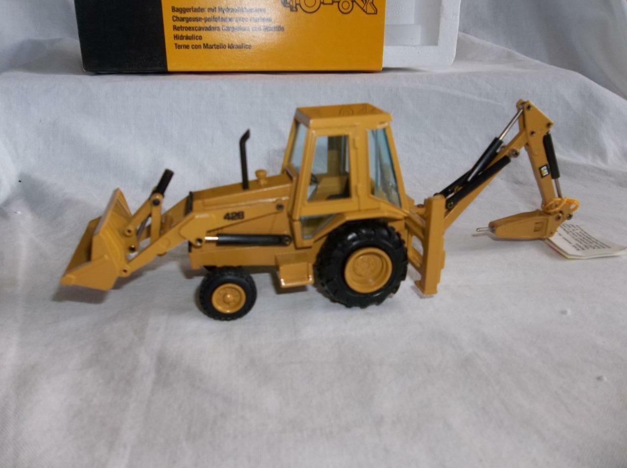 MIB NZG #378.1 CAT 428 Backhoe Loader w/Hydraulic Hammer Ser No 225 1:50 Scale