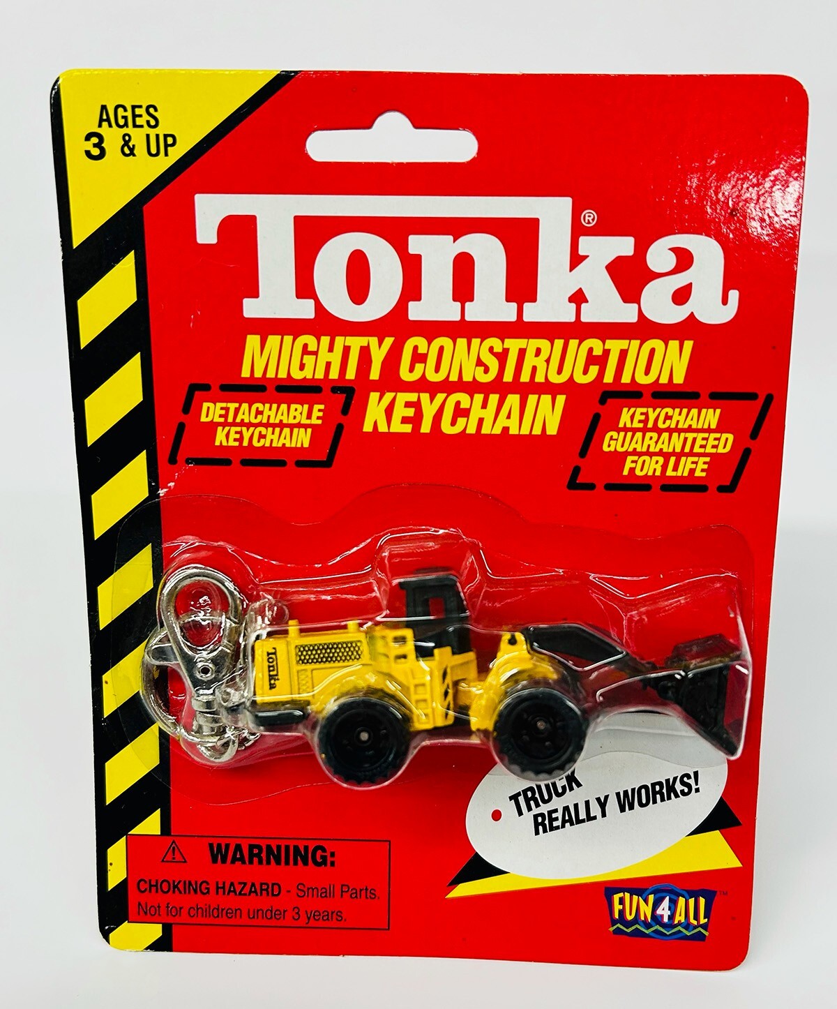 Bundle: 4 NOS Tonka Mighty Const Keychains | Toy Trucker & Contractor