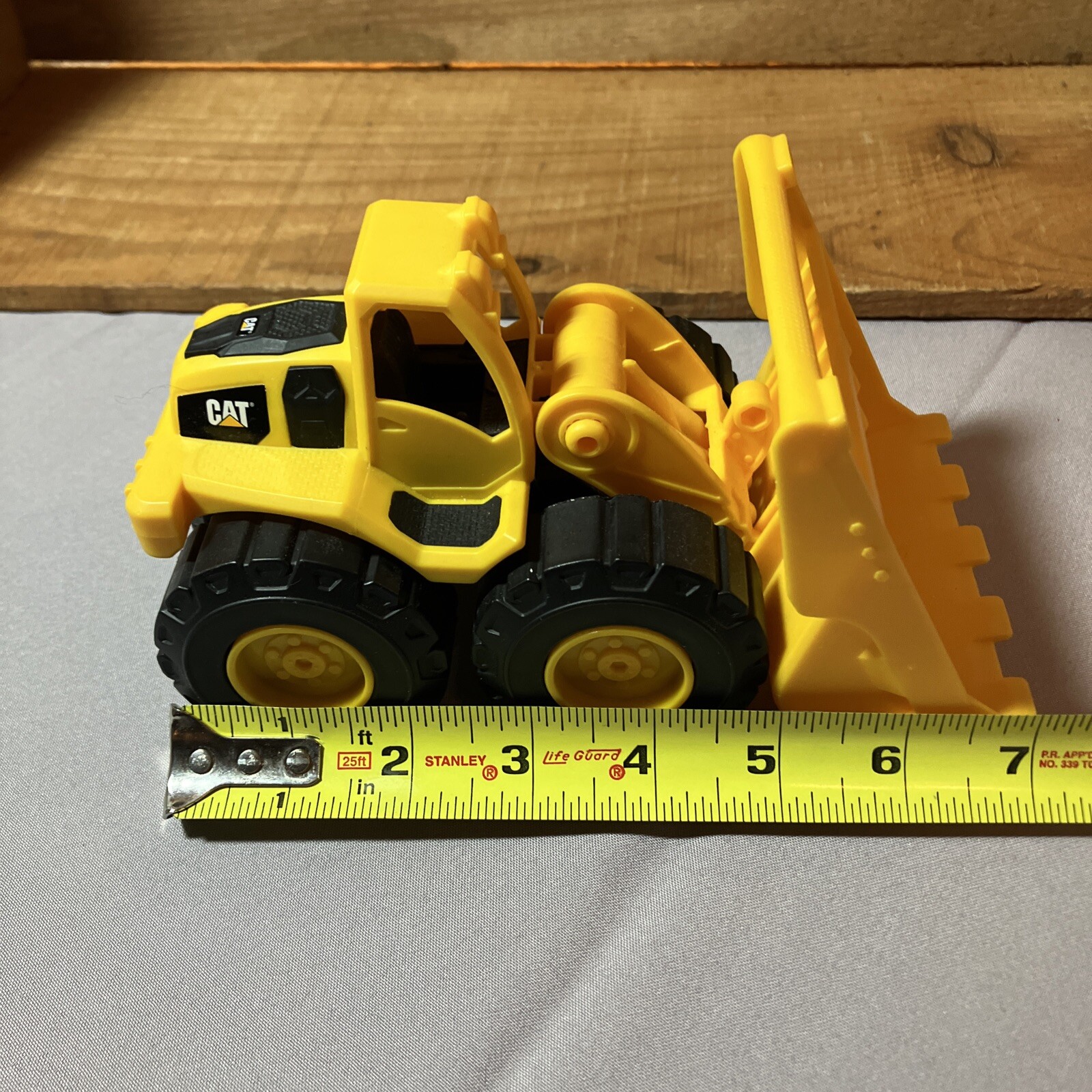 CAT Construction 7” Plastic Wheel Loader Toy Yellow