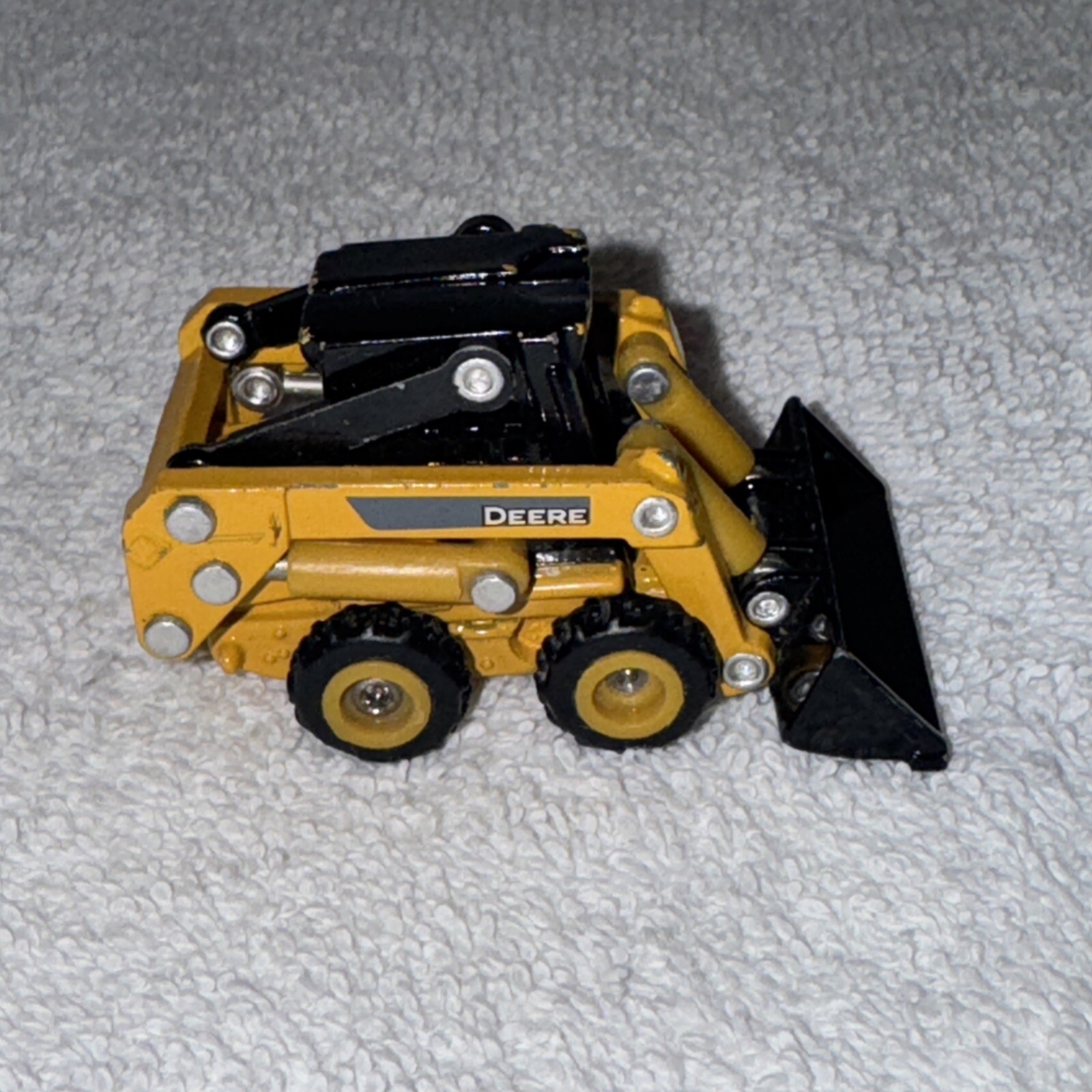 Ertl 1/64 John Deere 320D Skid Steer Model Loader