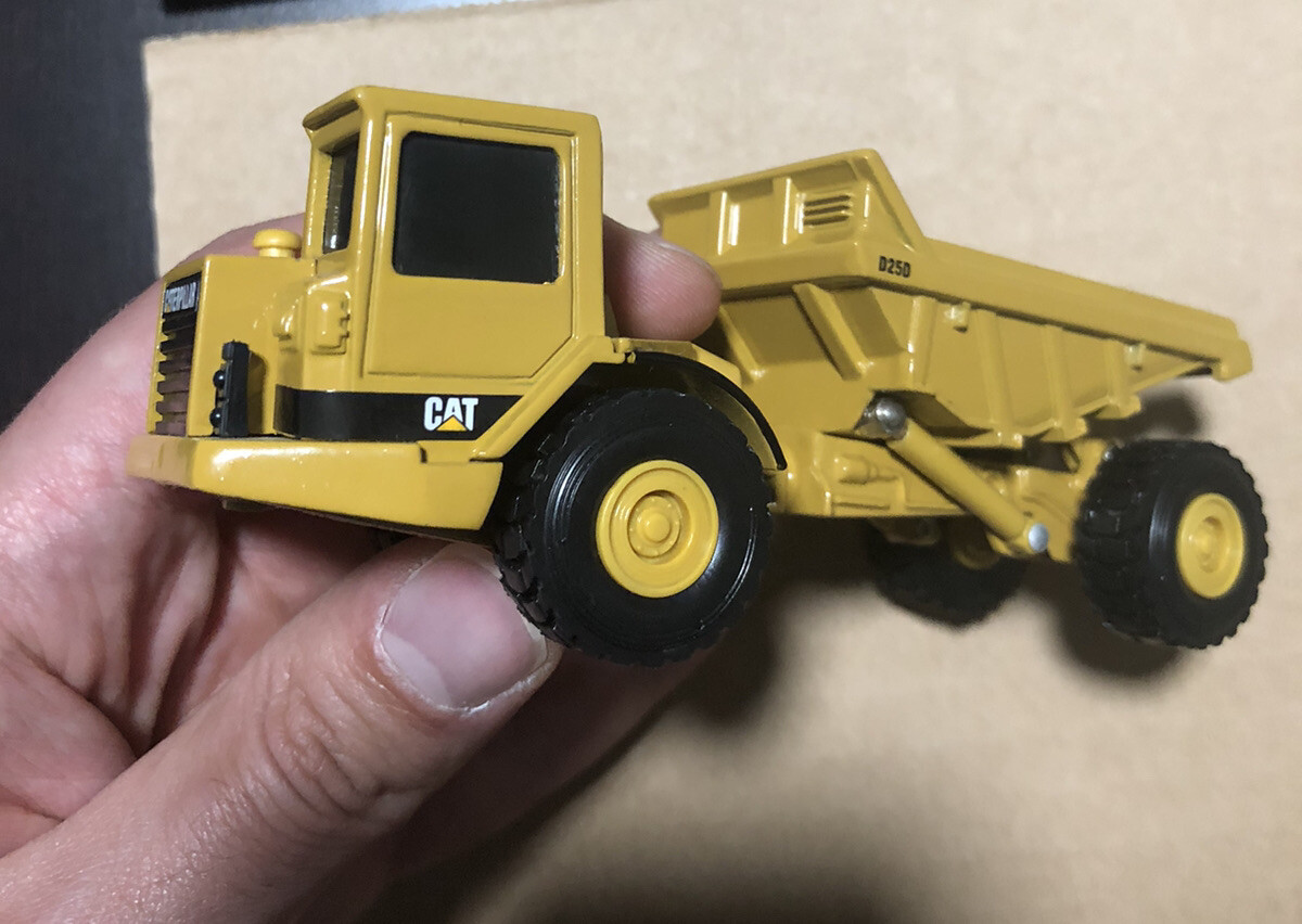 1998 Norscot Group 55706 Caterpillar D25D Articulated Truck 1:64 Diecast