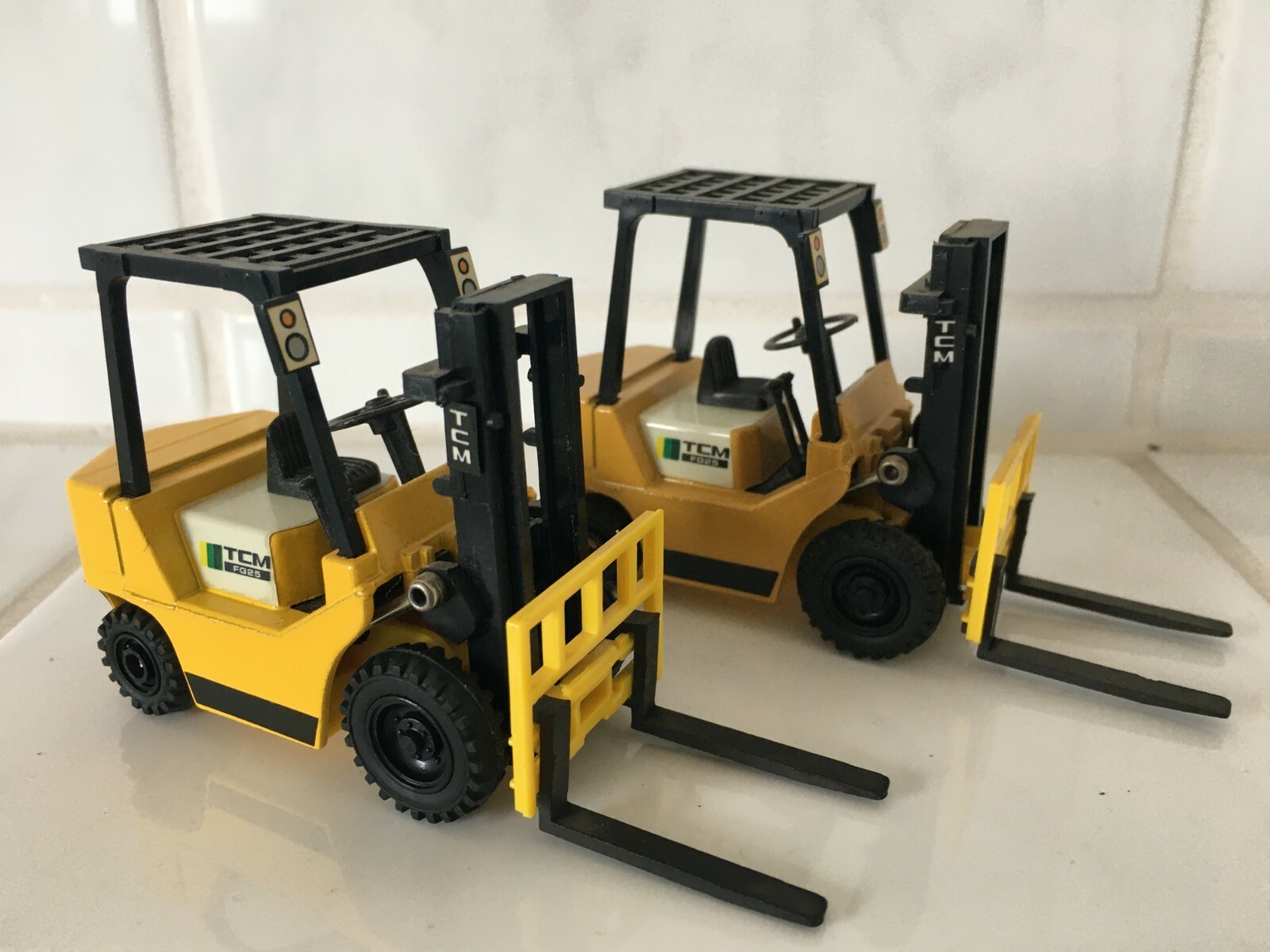 TCM ( = unicarriers ) LIGHT yellow forklift fork lift truck