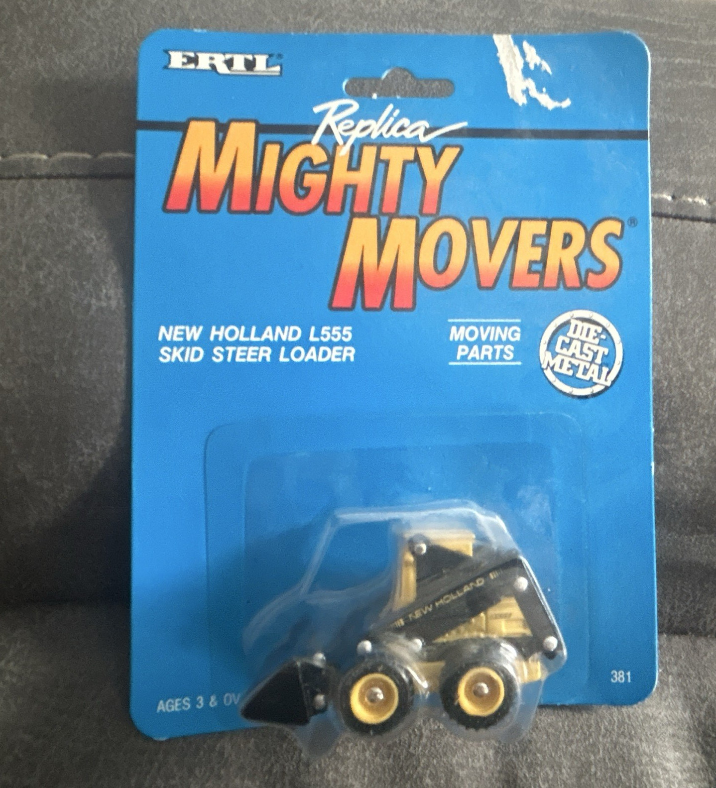 Ertl Mighty Movers New Holland L555 Skid Steer Loader 1:64 Diecast, Unopened Box