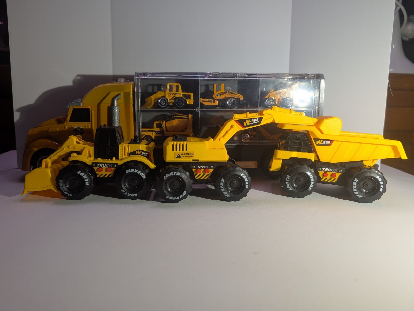 Yellow Construction Vehicle Toy Set with Carrier Truck, Models W-688, TH600D
