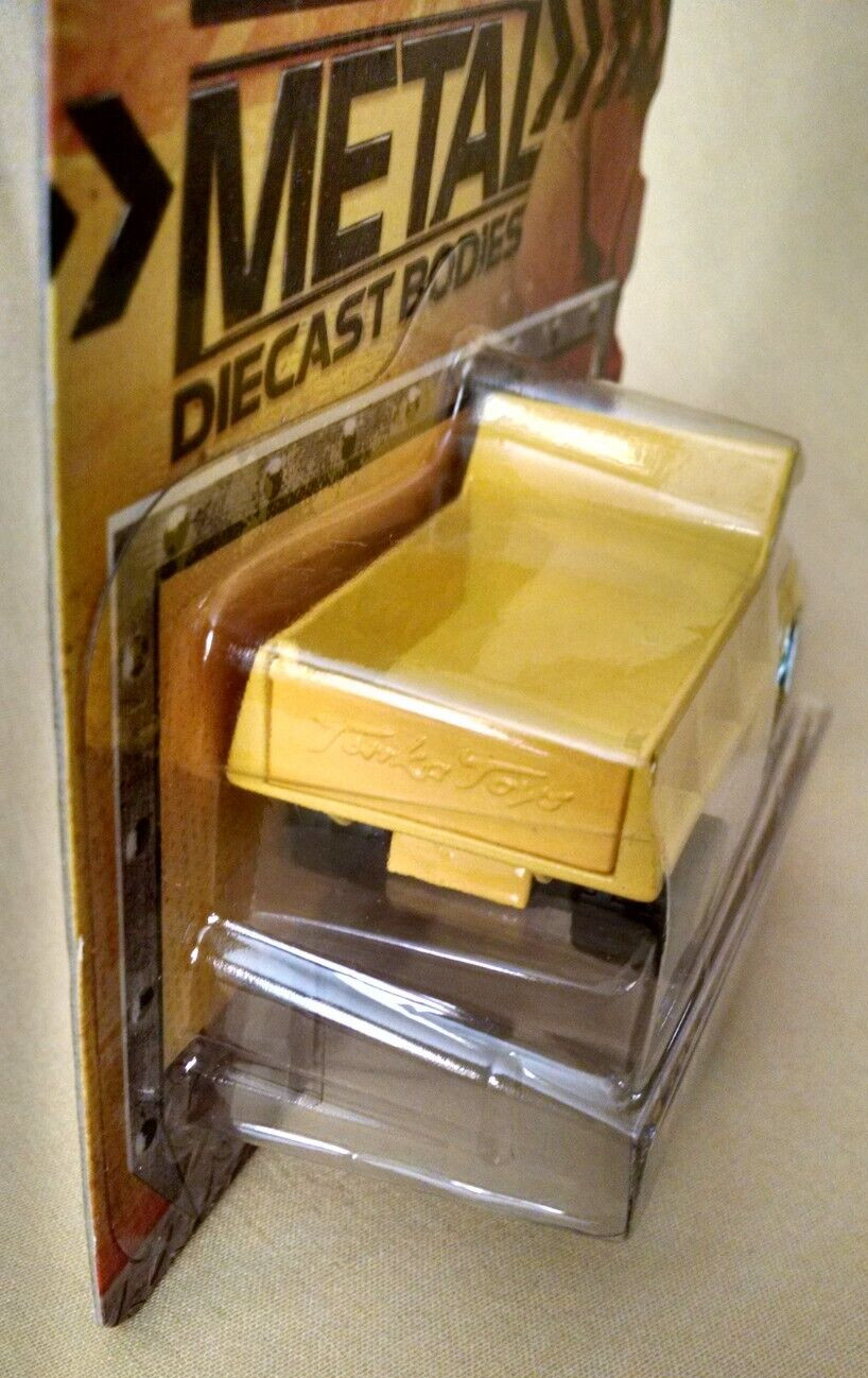 TONKA DUMP TRUCK METAL DIECAST BODIES ITEM NO 06402 NEW 2012 SEALED TOY YELLOW.