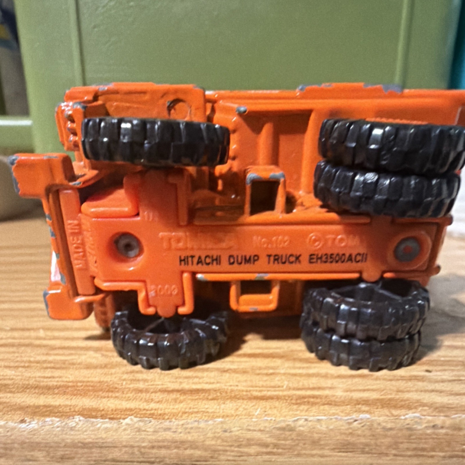 Tomica Hitachi EH3500ACII Dump Truck No.130 1:144 Diecast Tipping Orange