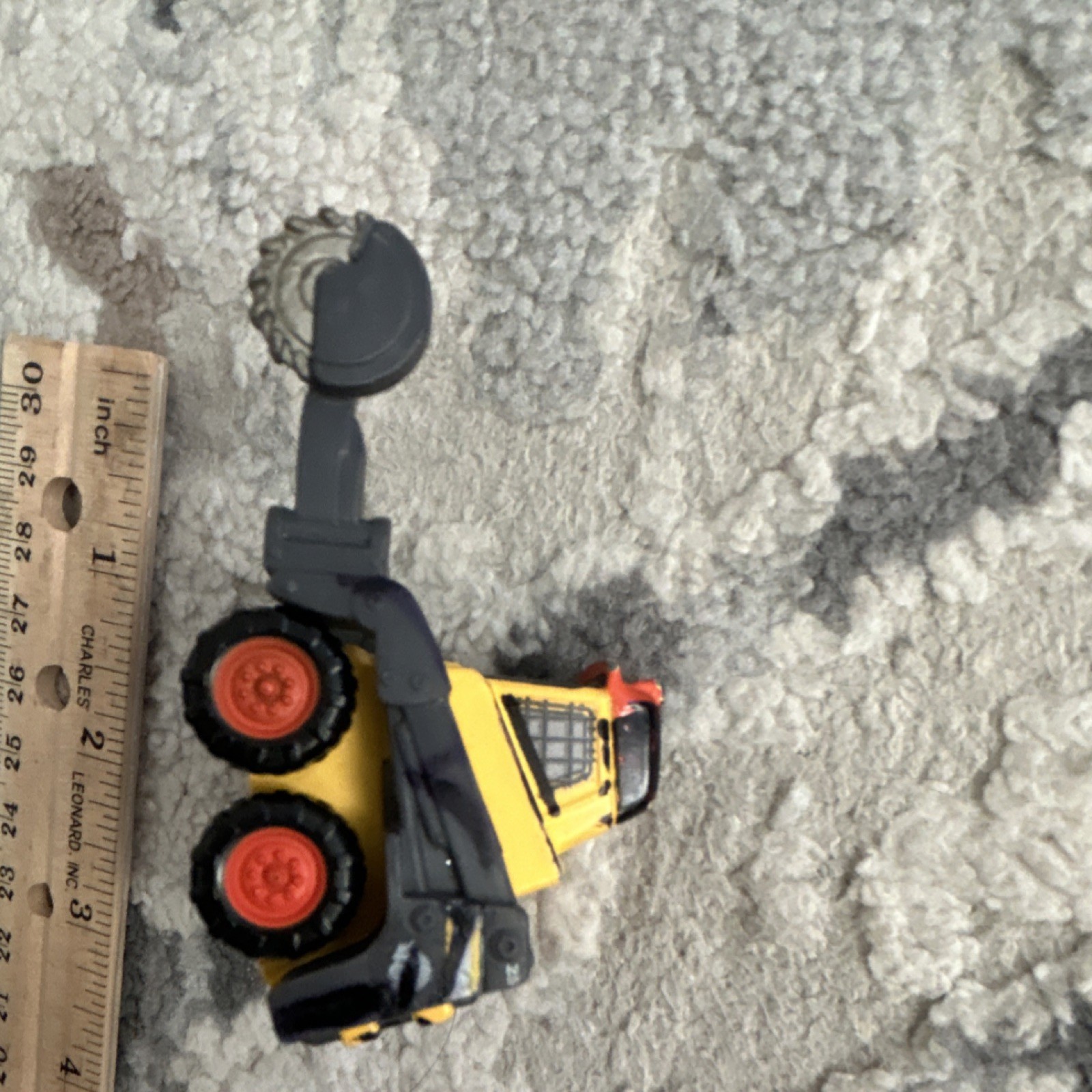Yellow Black Orange Plastic Construction Vehicle Toy with Rotating Saw Arm