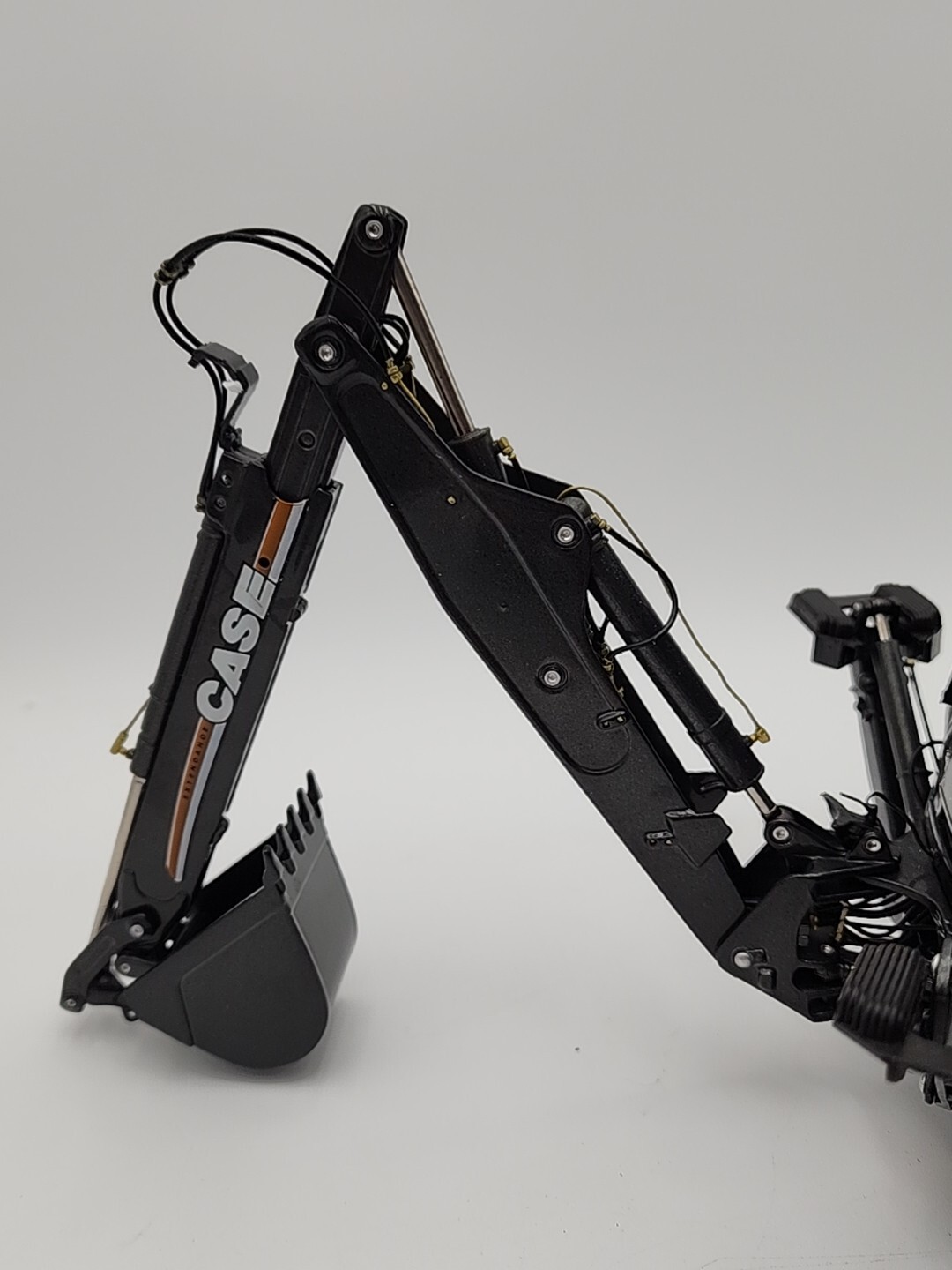 ERTL Case 580 Super M Series 2 Loader Backhoe 50th Anniversary Black 1/16