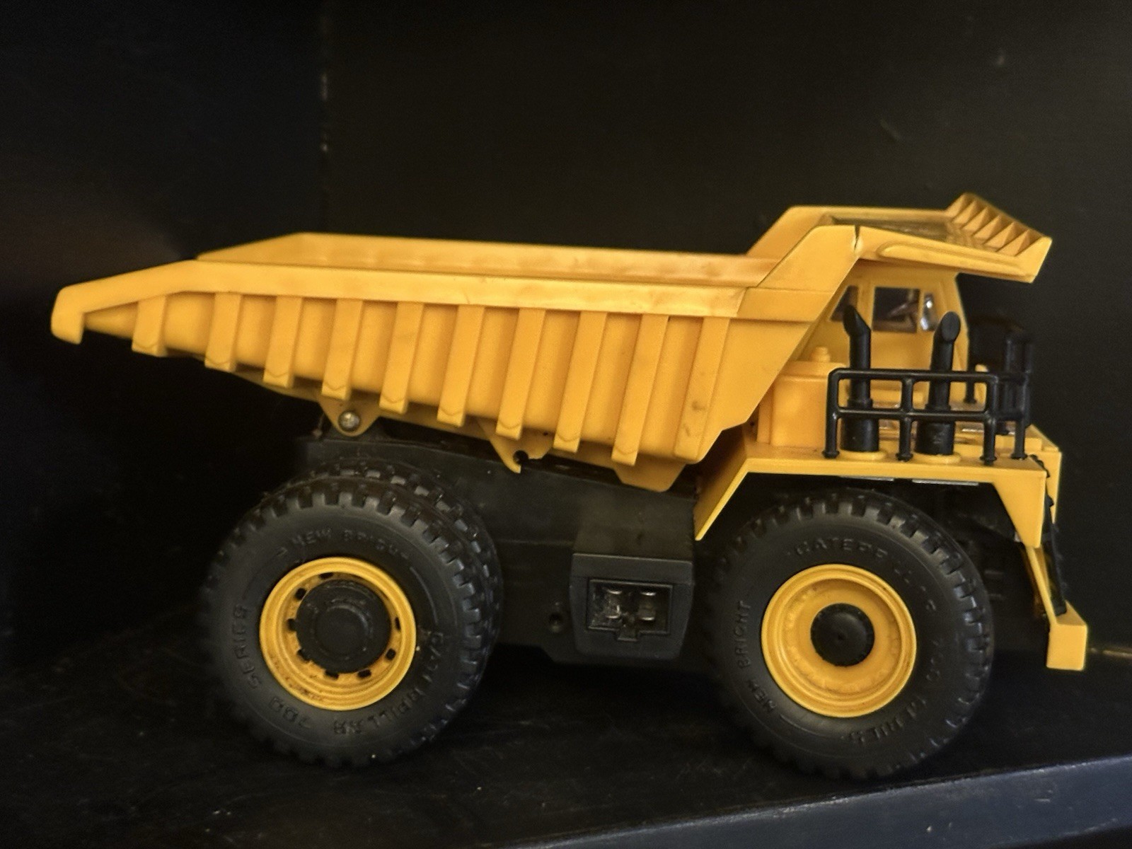 Vintage CAT Dump Truck New Bright 1987 Caterpillar Construction Toy