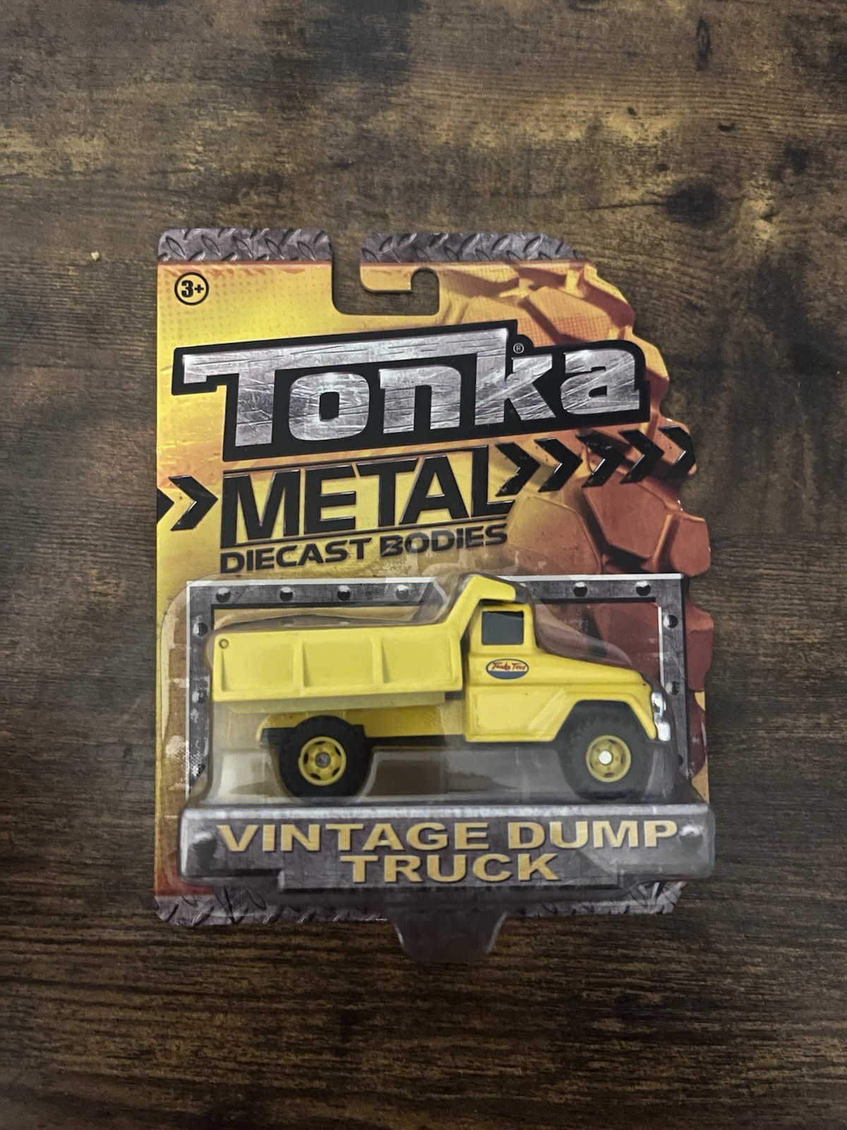 TONKA DUMP TRUCK METAL DIECAST BODIES ITEM NO 06402 NEW 2012 SEALED TOY YELLOW.