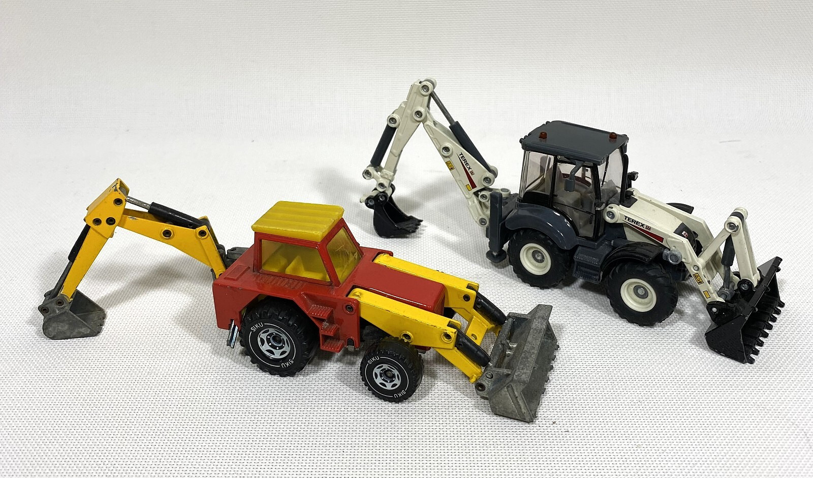 2 Vntg SIKU W. Germany DIECAST BACK HOE LOADERS #2818 & #3531 (Minor Damage)