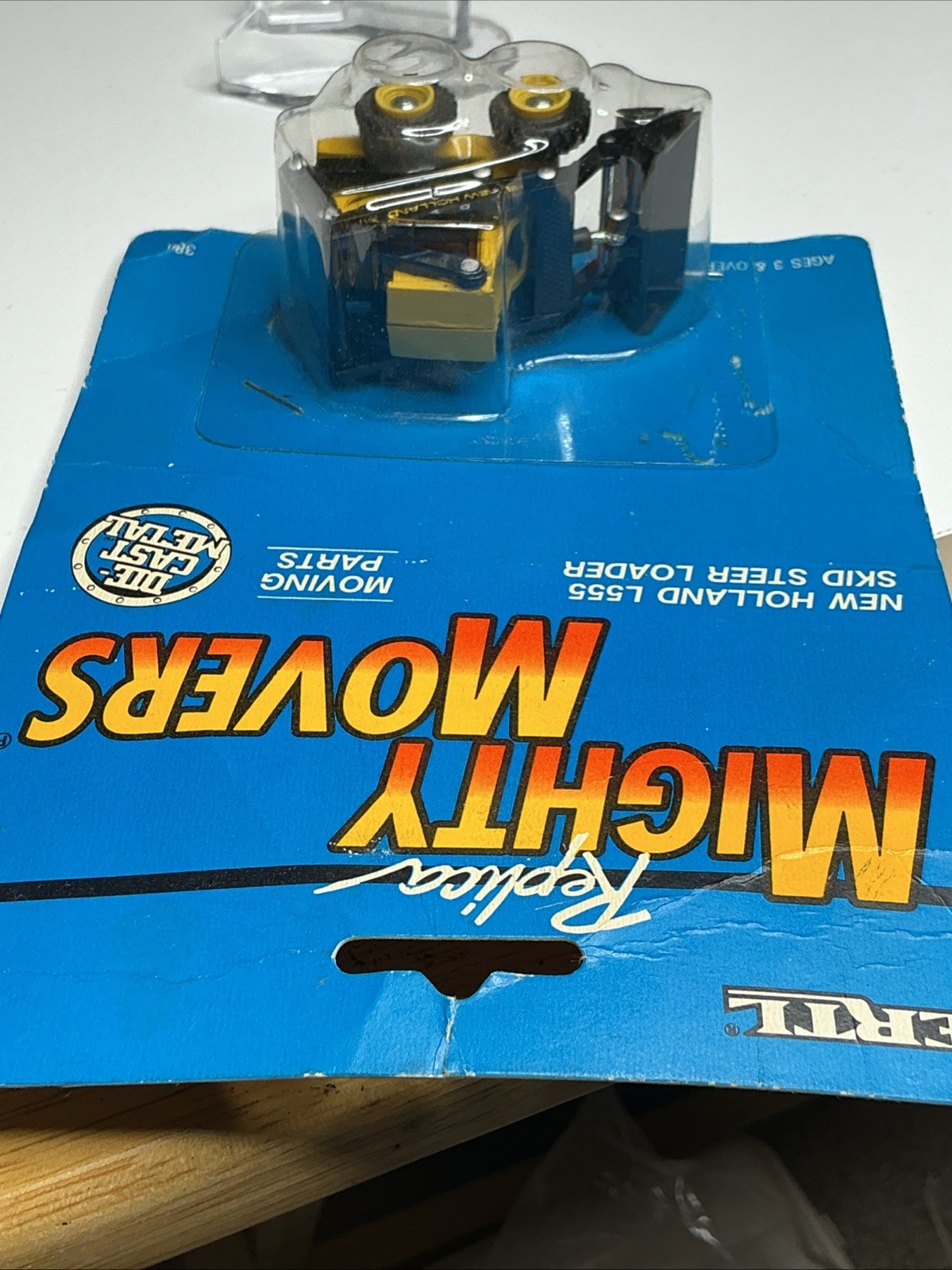 Vintage Ertl Mighty Movers New Holland Skid Steer Loader L555
