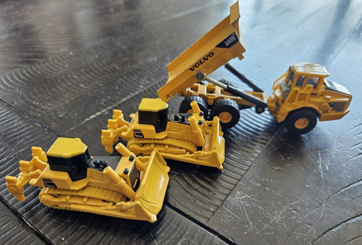 Small toy lot, TOMICA KOMATSU 155AX DOZERS qty2, SIKU VOLVO A40D HAUL TRUCK qty1
