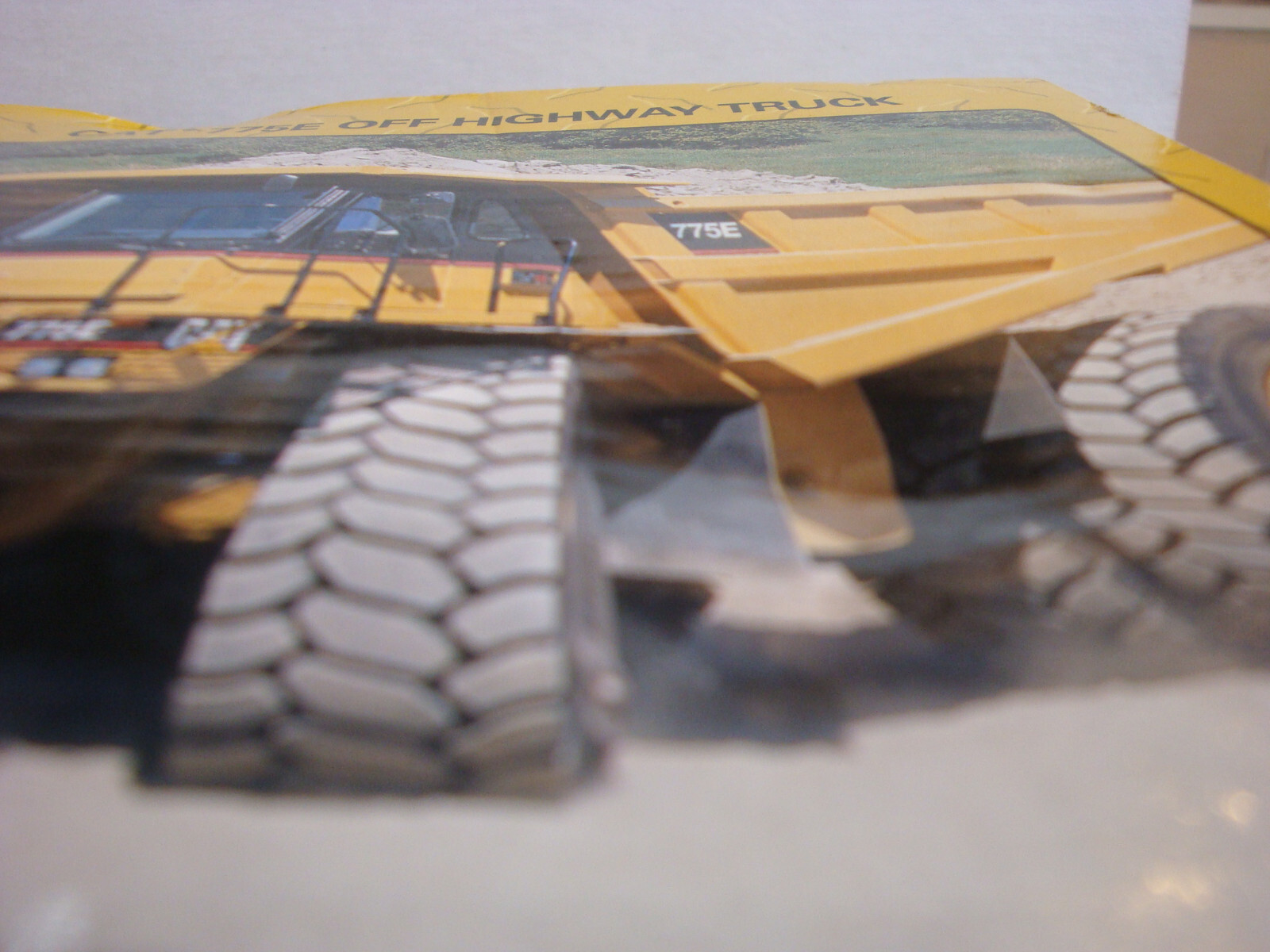 Norscot 1:64 Scale CAT 775E Off Highway Truck Yellow Fair Box