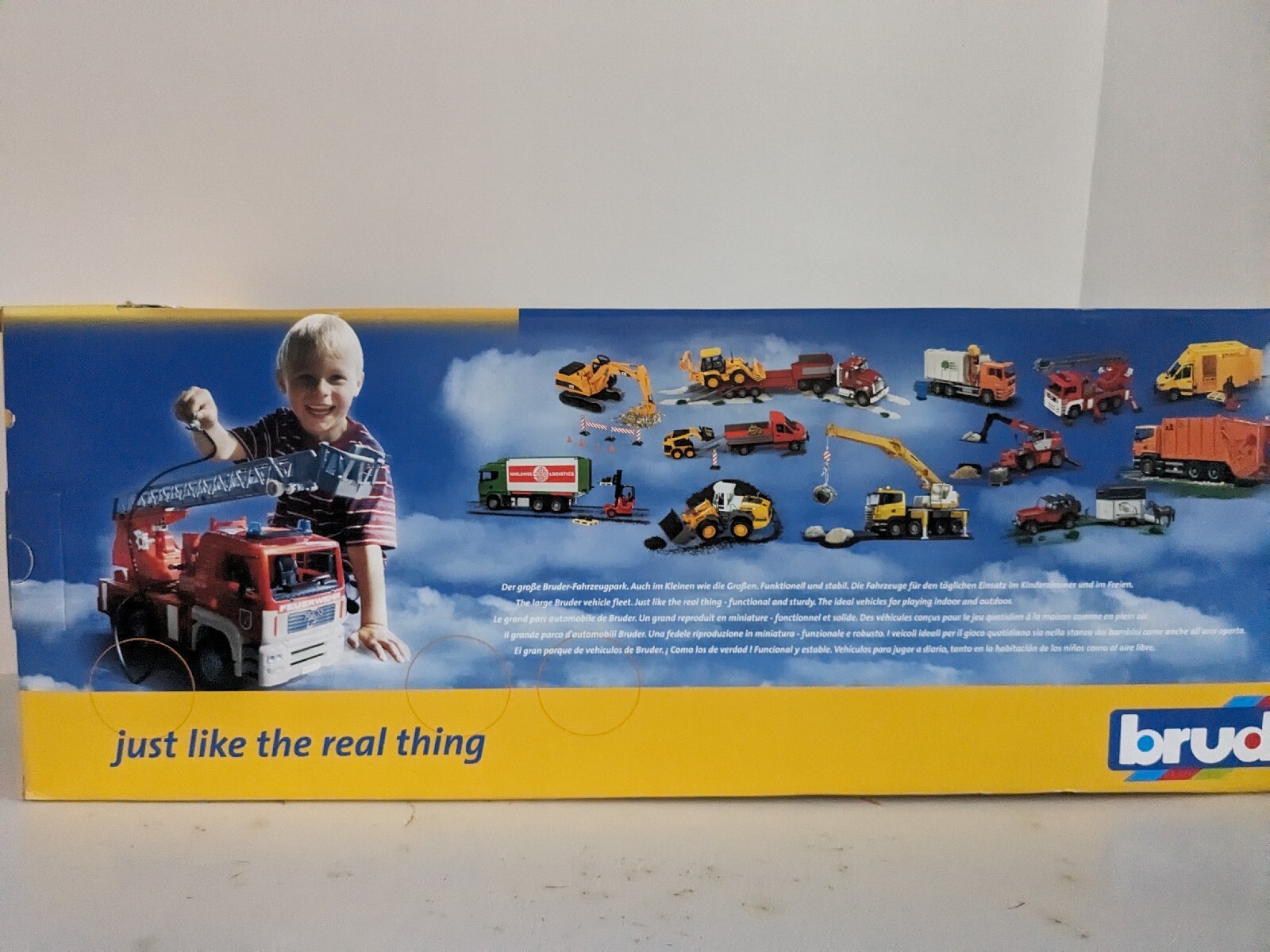 BRUDER MACK GRANITE HALF-PIPE DUMP TRUCK 02823