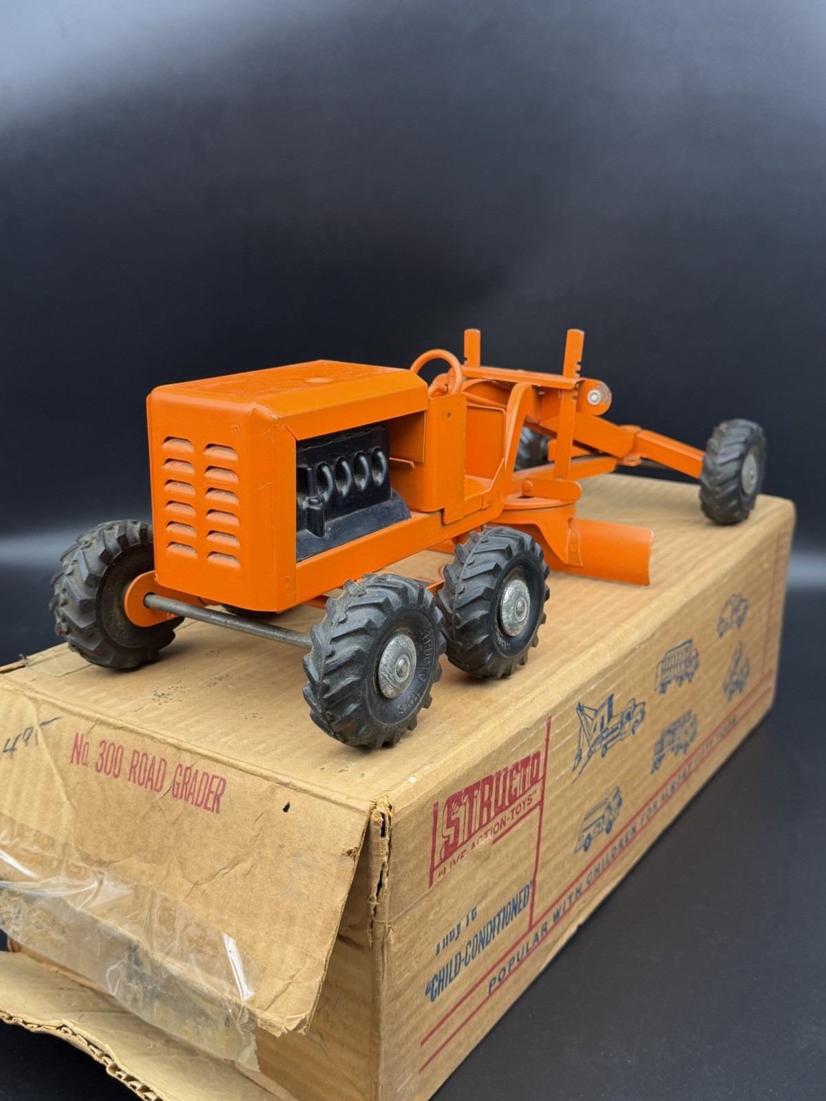 Vintage Structo Toys Road Grader No. 300 Orange Pressed Steel W/ Box