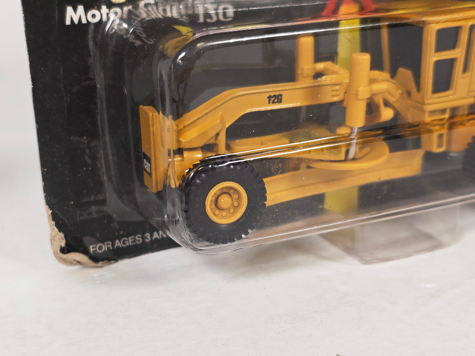 Ertl 1848 • Caterpillar • CAT 12G Motor Grader • New in Blister Pack