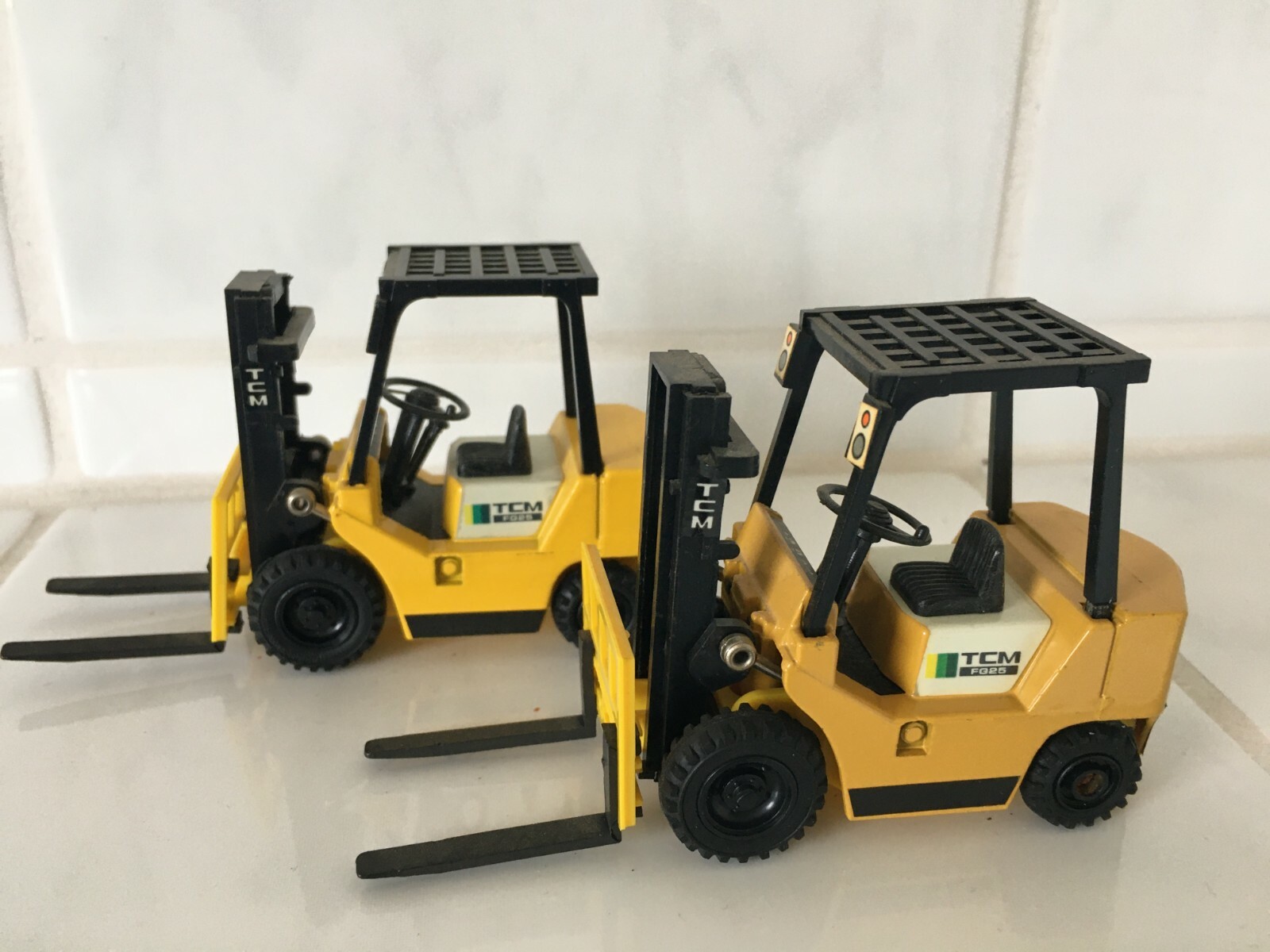 TCM ( = unicarriers ) LIGHT yellow forklift fork lift truck