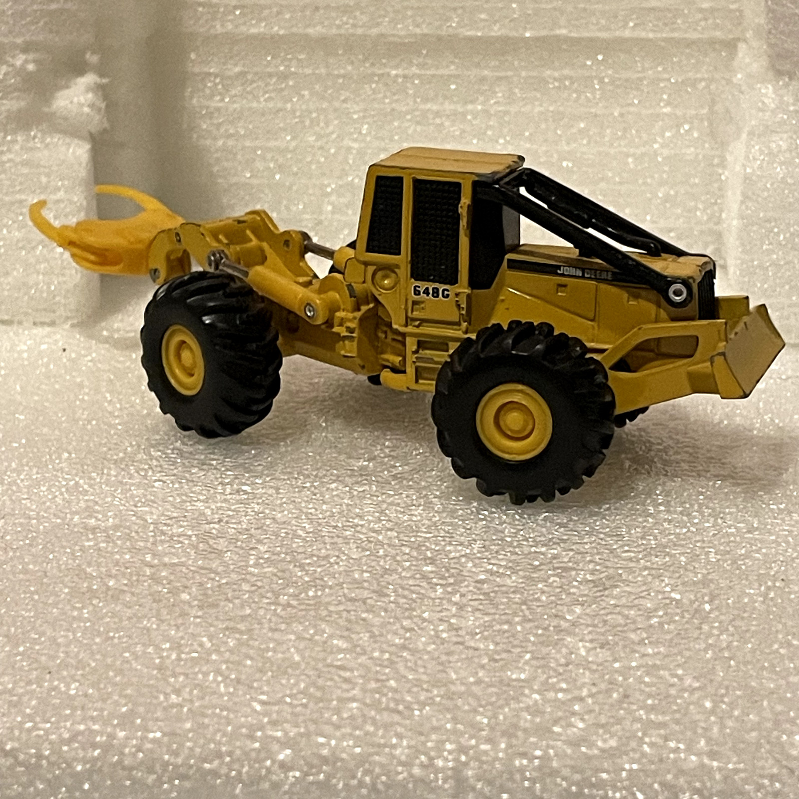 vintage 1/64 John Deere 648G Log Skidder rare yellow