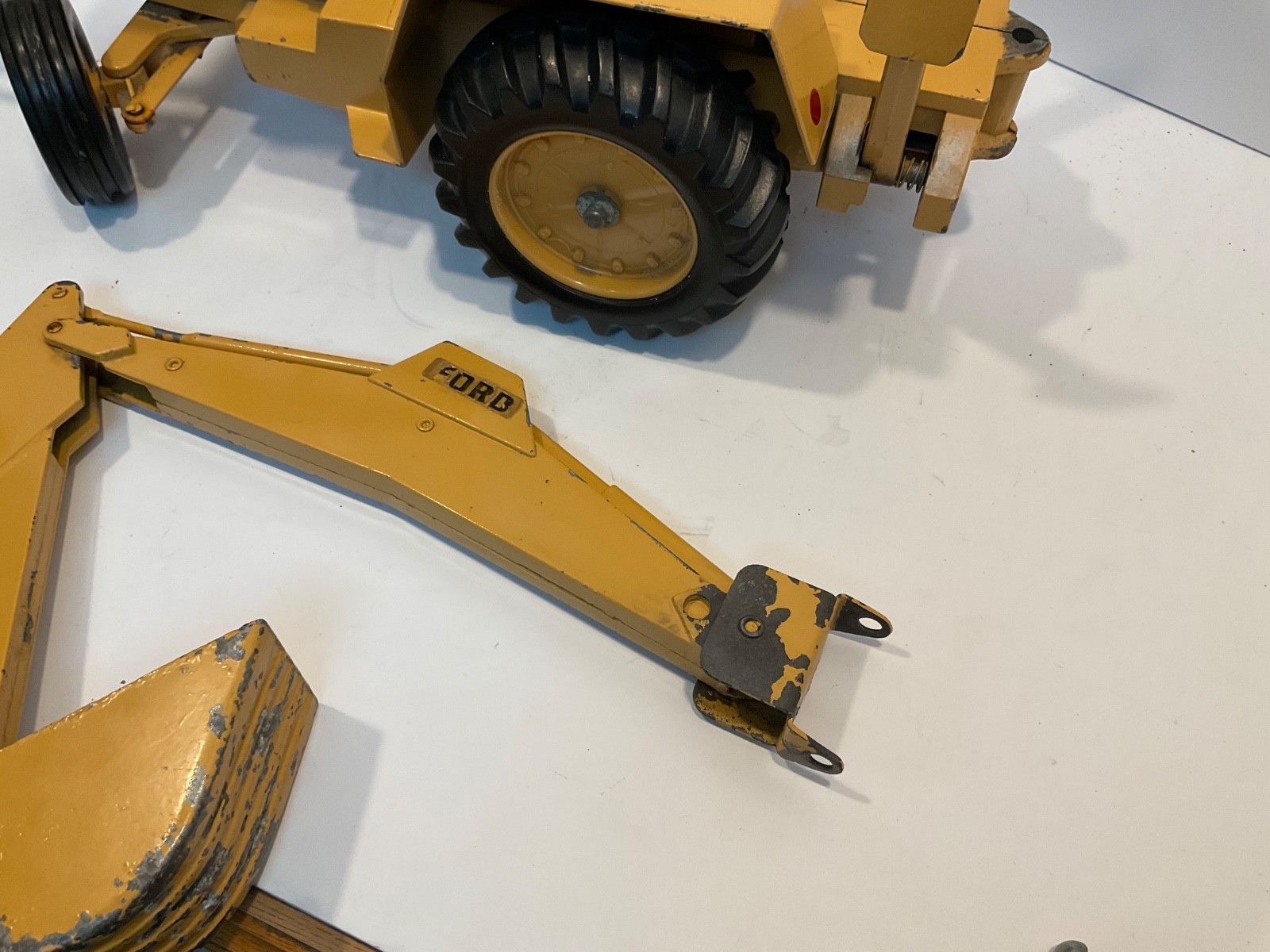 Vintage Ertl Ford 755A Backhoe Loader 1/12 for parts or restoration.