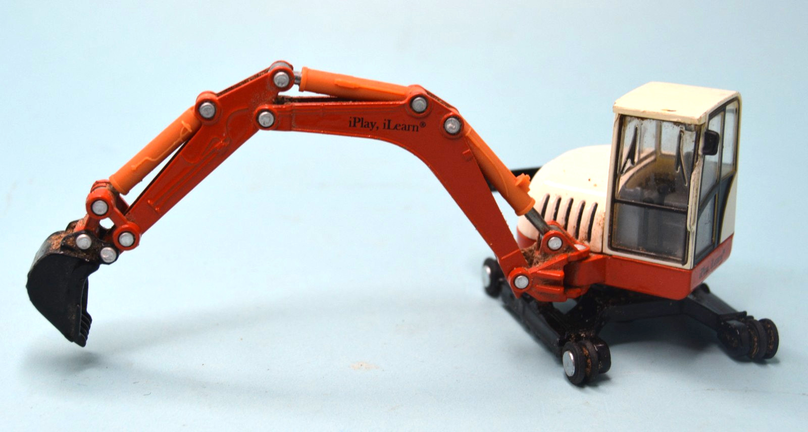 Diecast orange mini-track backhoe excavator