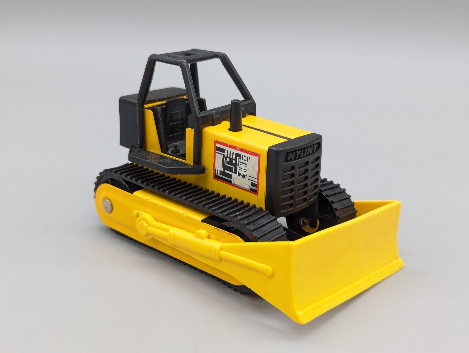 Nylint 4.5″ Yellow & Black Dozer Metal Plastic 70’s 80’s Vintage Toy