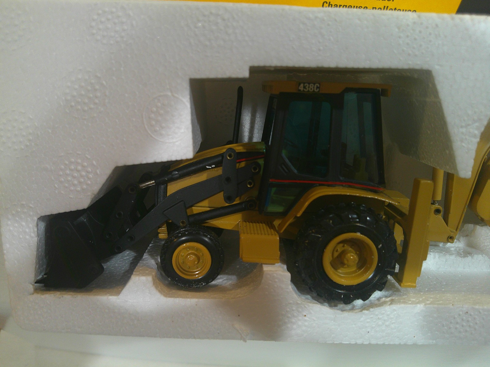 NZG CAT 438C Backhoe Loader Official Launch Edition #430 1:50 Yellow VG Box
