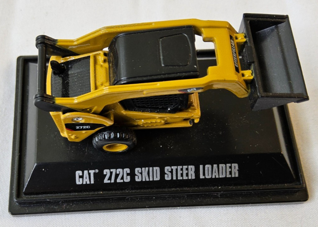 Norscot Group Inc. CAT 272C Skid Steer Loader on stand -missing front wheels