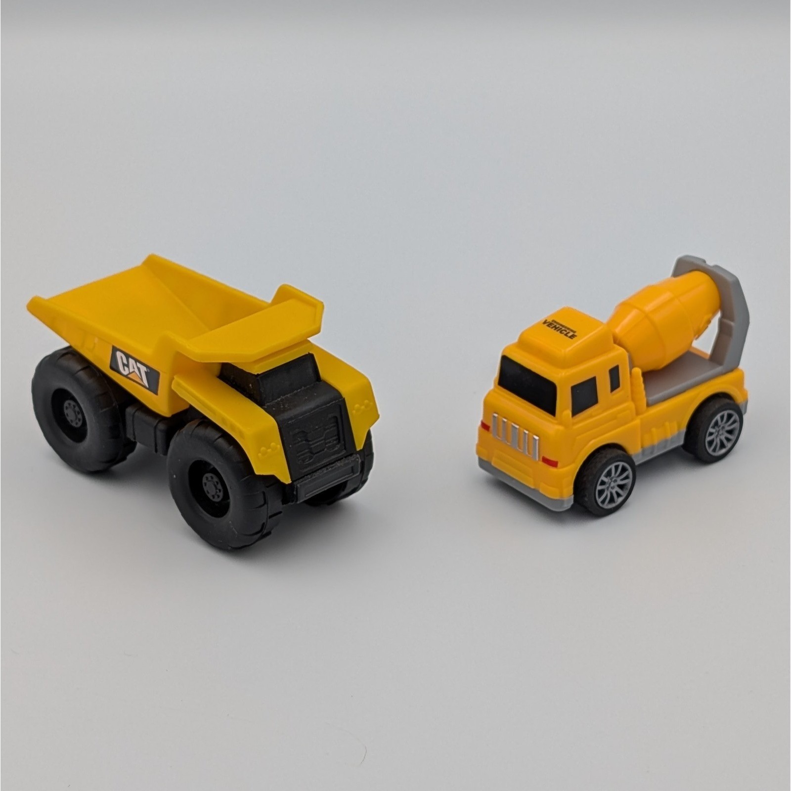 Funrise CAT Dump Truck and Cement Mixer Toy Vehicle Set Yellow Construction 2pc