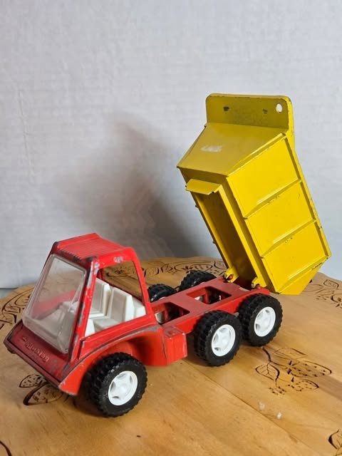 This vintage 1969 Gabriel Industries Inc. metal dump truck
