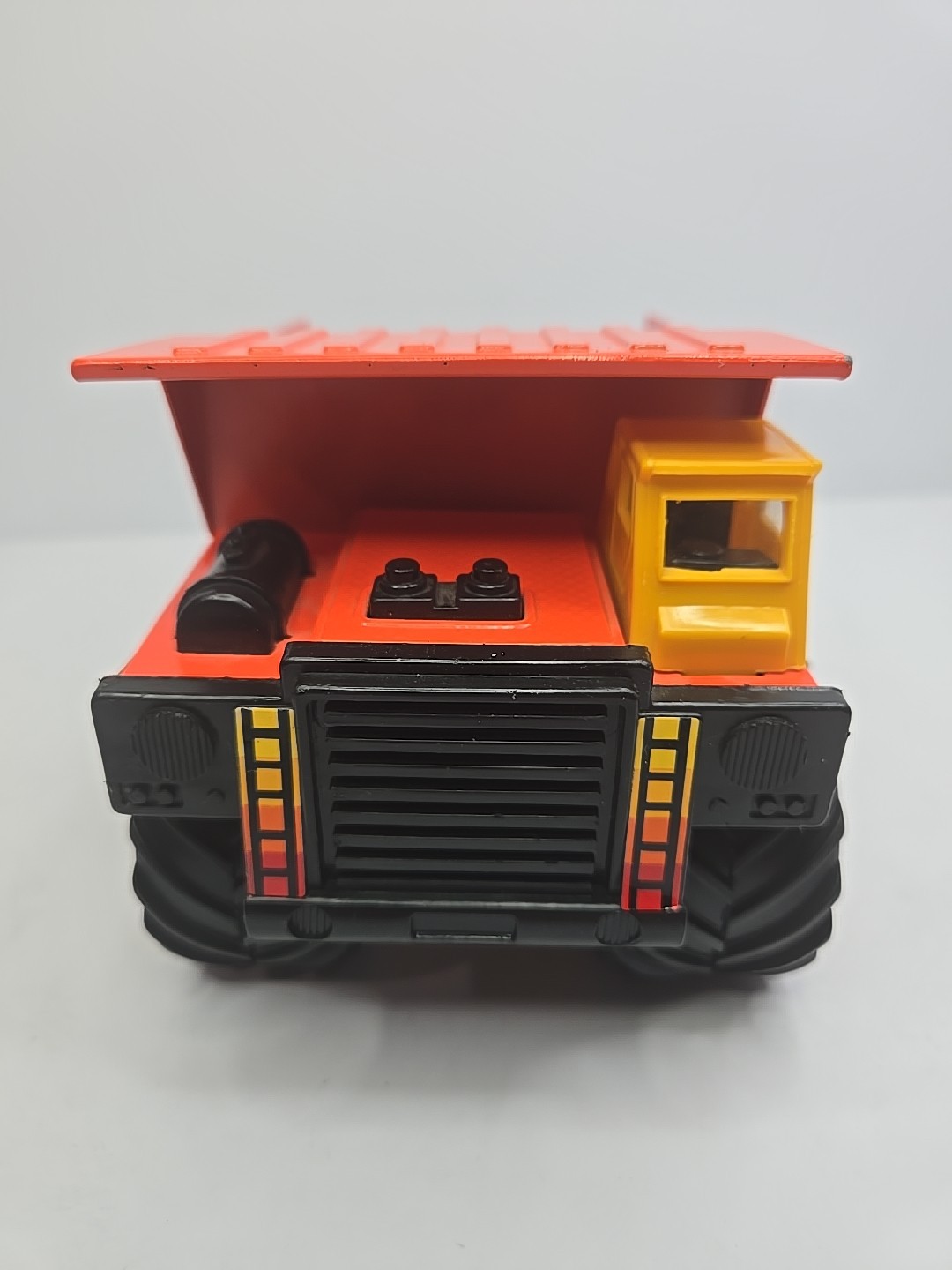 Vintage 1988 Remco Dump Truck Orange Black Yellow Toy 7” Construction