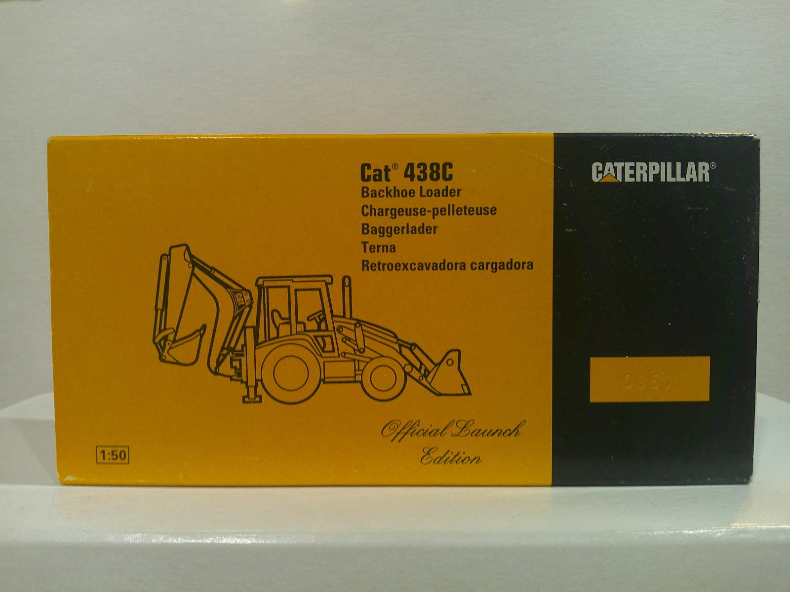 NZG CAT 438C Backhoe Loader Official Launch Edition #430 1:50 Yellow VG Box