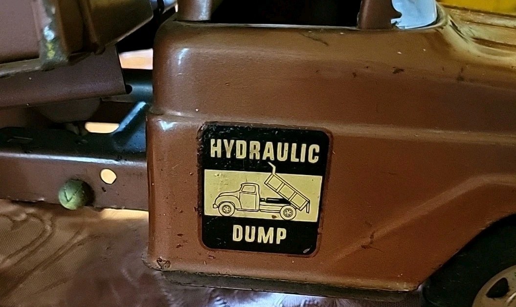 Vintage Tonka Hydraulic Bronze Dump Truck Toy Very Good Condition.