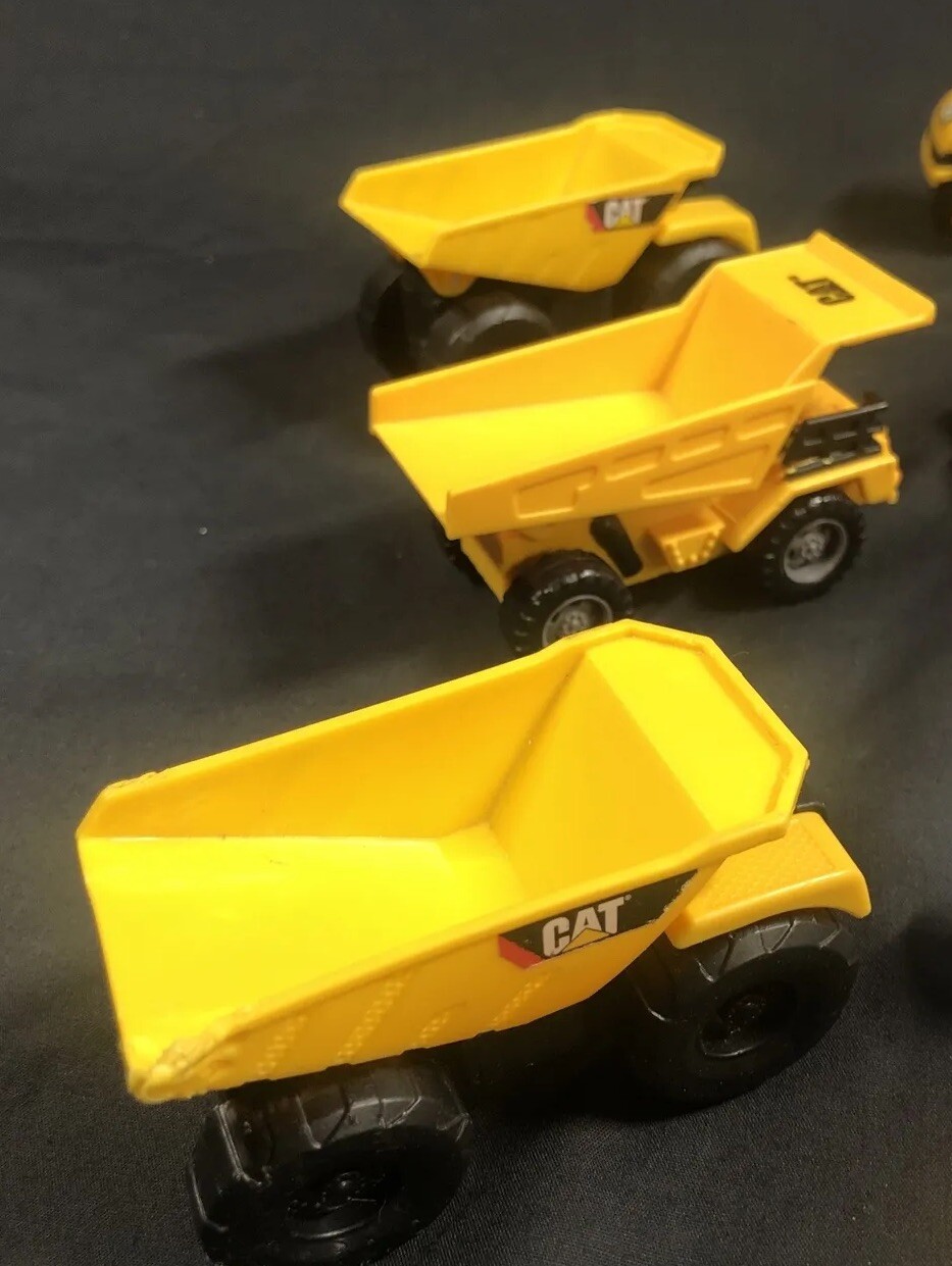 Caterpillar Construction Toy Plastic Mini Trucks lot Of 11 With Acessories.