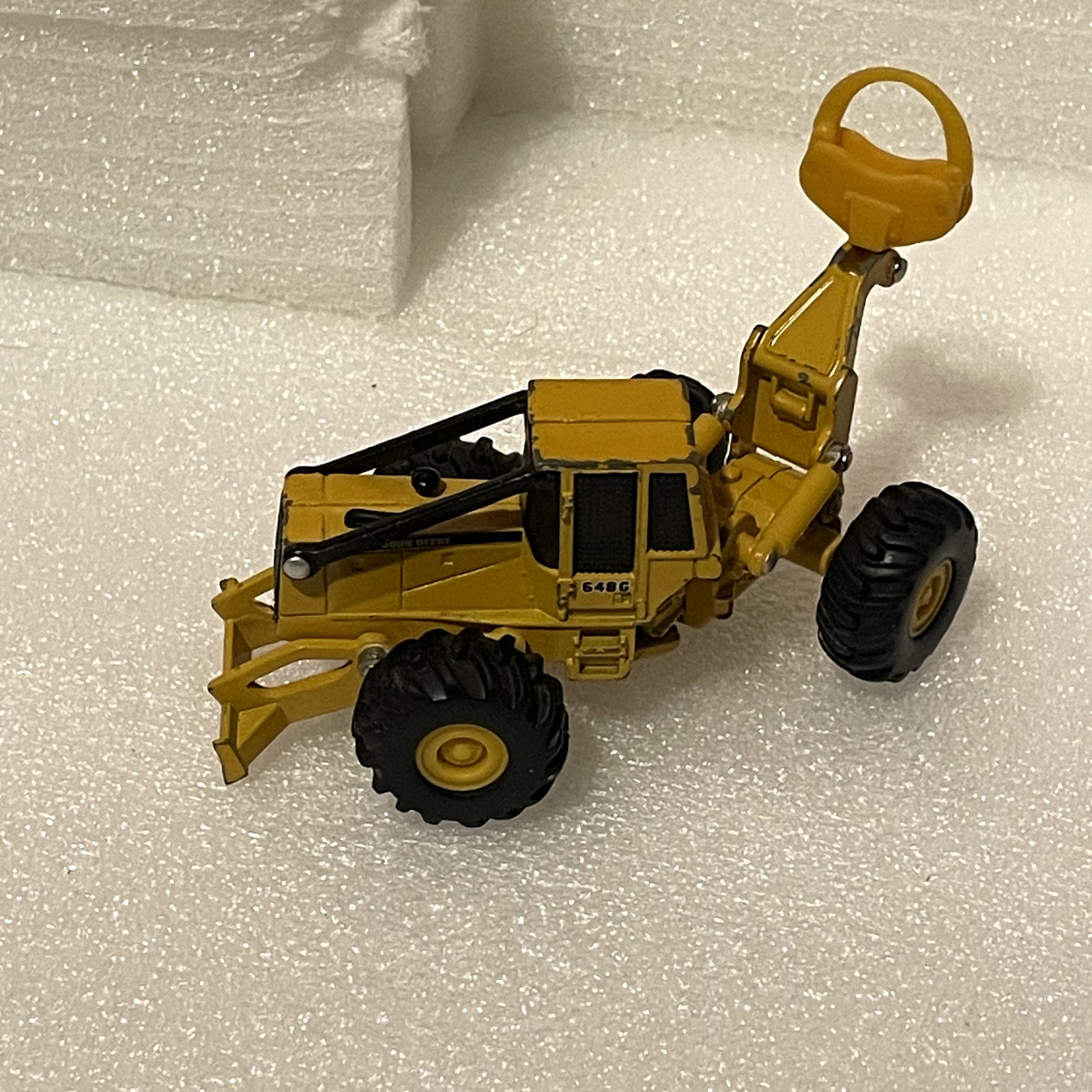 vintage 1/64 John Deere 648G Log Skidder rare yellow