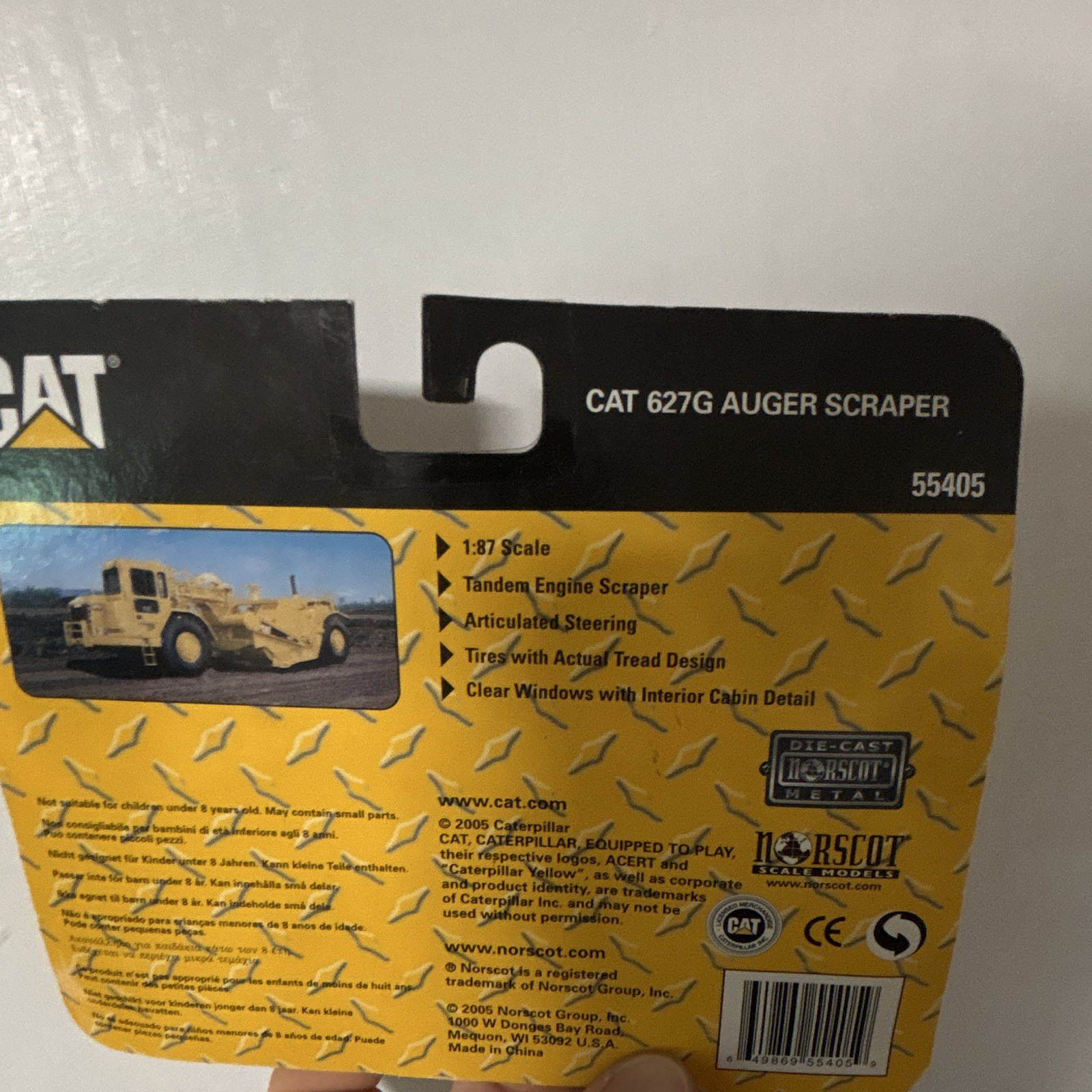 Norscot CAT 627G Auger Scraper 1:87 Diecast Metal Yellow/Black 55405