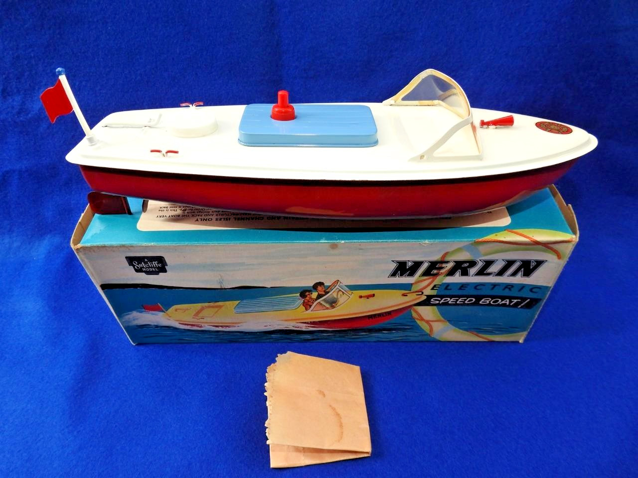 SUTCLIFFE MERLIN 1973 PRESSED STEEL ELECTRIC SPEED BOAT VNM IN BOX + FLAG