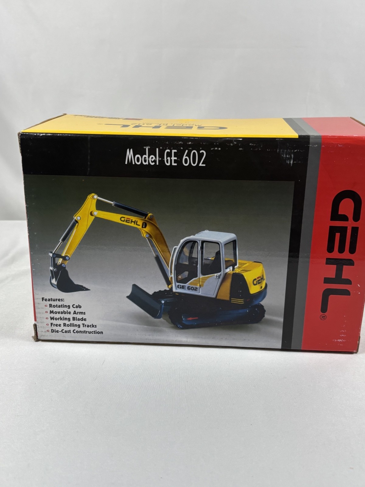 Die-Cast Promotions 1:25 Scale Model of a Gehl GE 602 Compact Excavator in Box