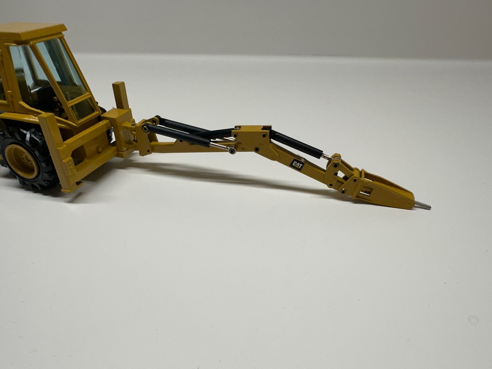 NZG Gehl 4610 Skid Steer Loader 1:25 & Caterpillar 428 backhoe loader 1:50