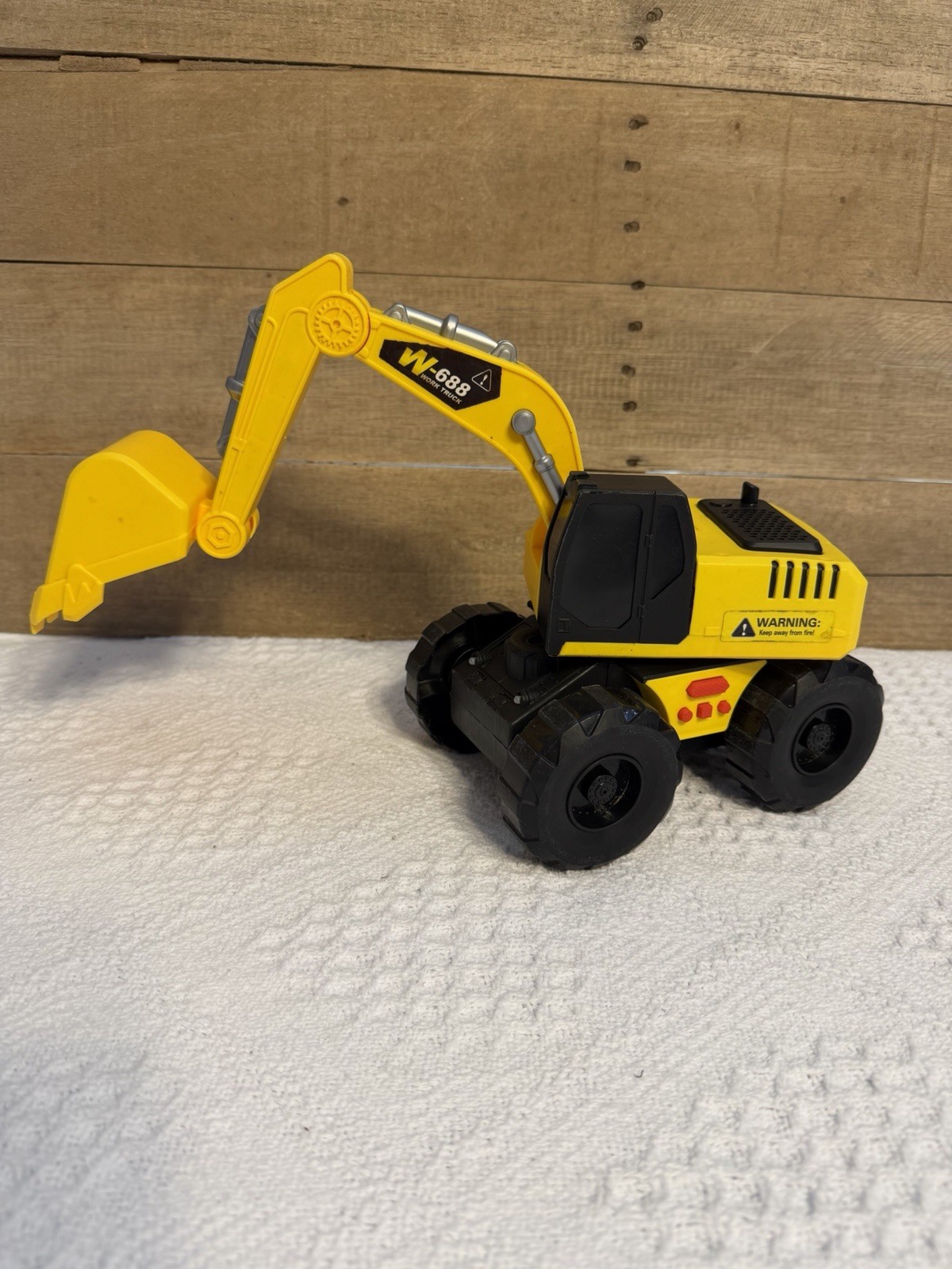 Yellow Electric Excavator Construction Vehicle Makes Noise Plastic Toy