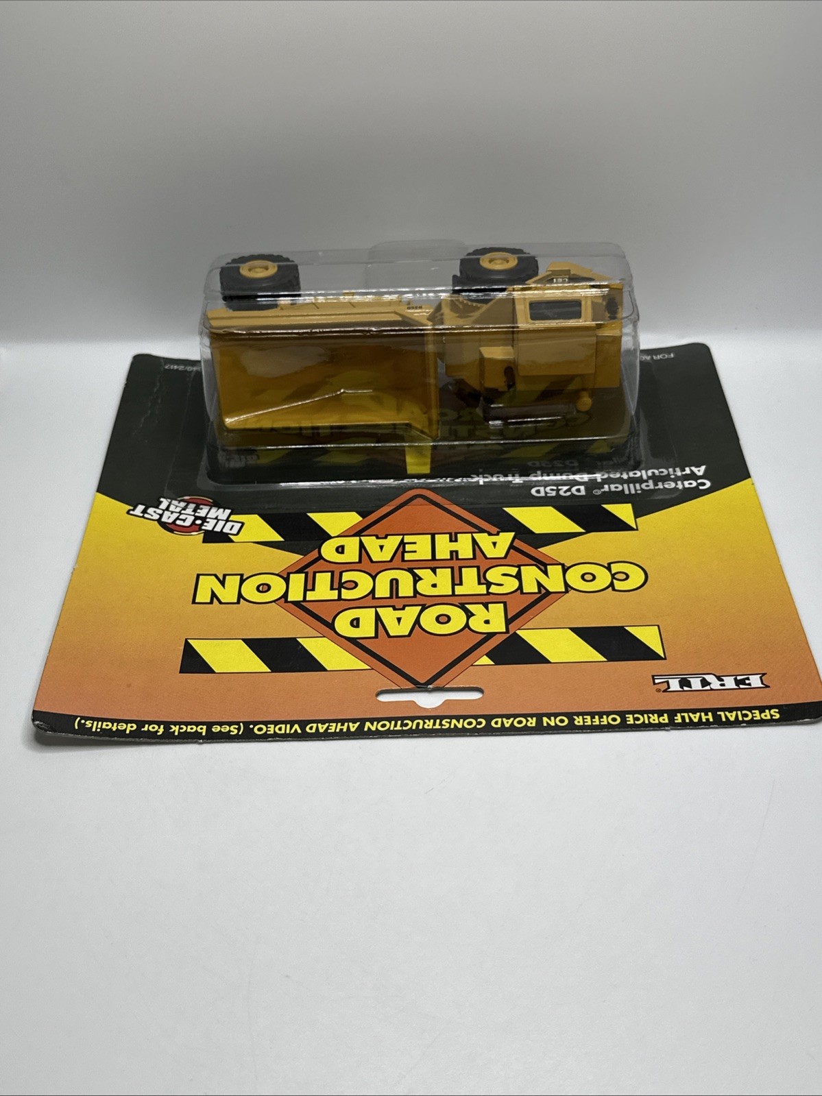 Vintage Ertl Road Construction Caterpillar D25D Articulated Dump Truck, 1995 NEW