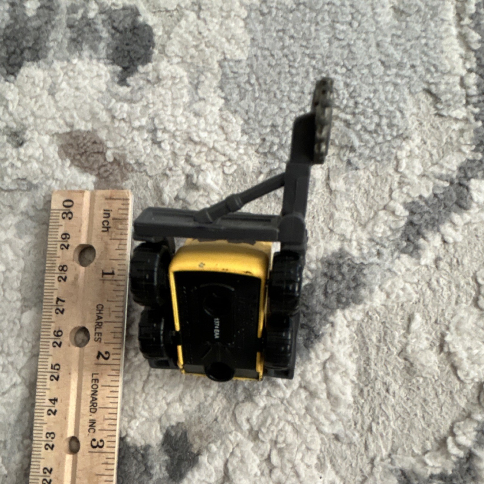 Yellow Black Orange Plastic Construction Vehicle Toy with Rotating Saw Arm