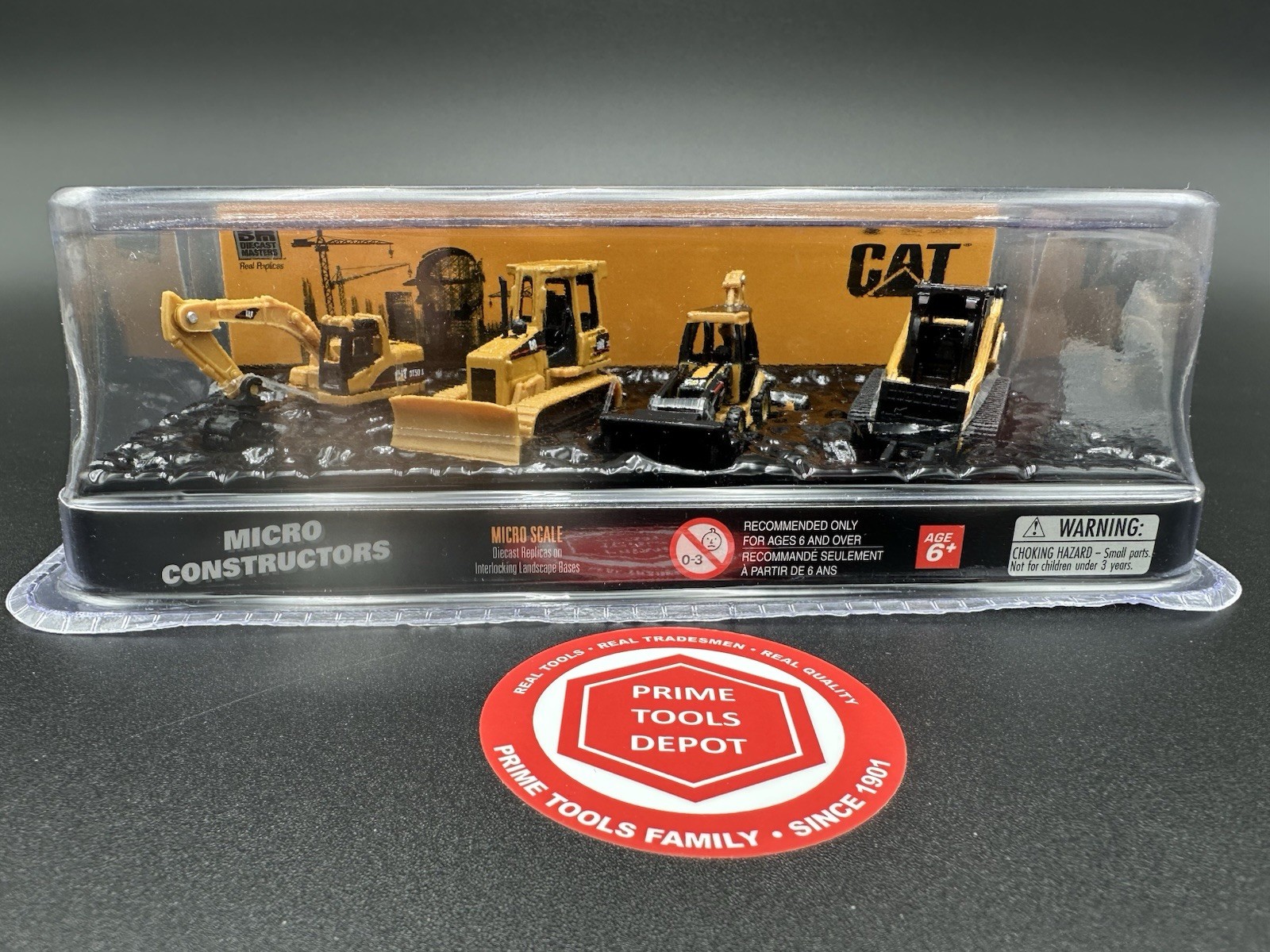 CAT Micro Constructors Diecast Construction Trucks, 100th Anniversary Set of 4